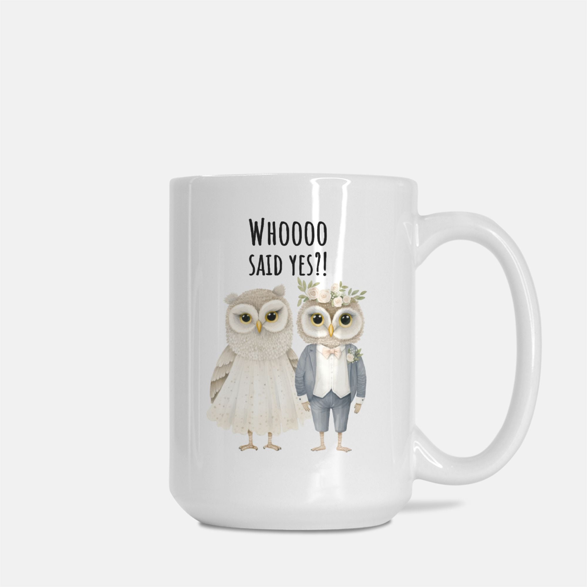 Mug with cartoon owls and text 'WHOooo said yes?!' on a white background