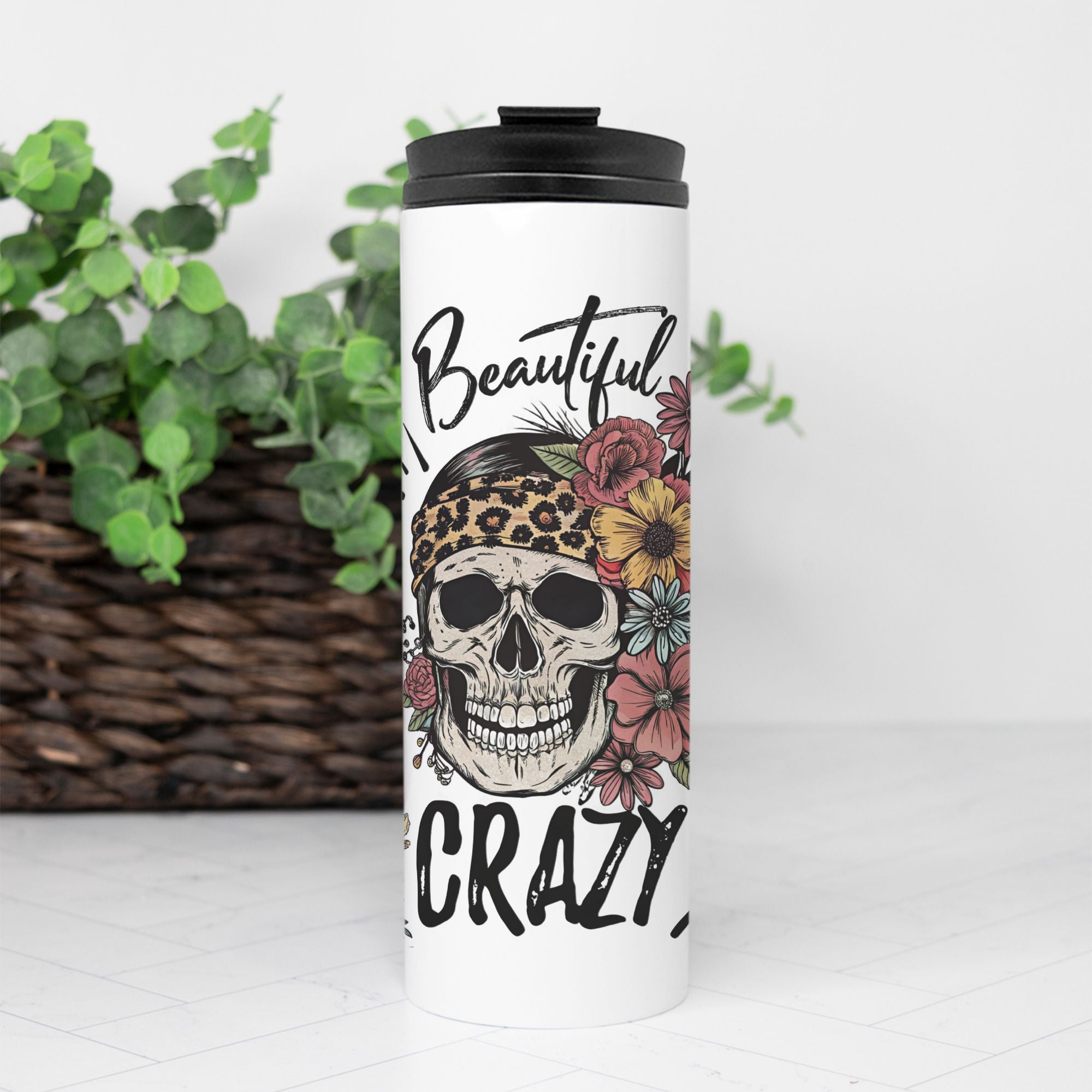 Tumbler with skull design and 'Beautiful Crazy' text on a white background
