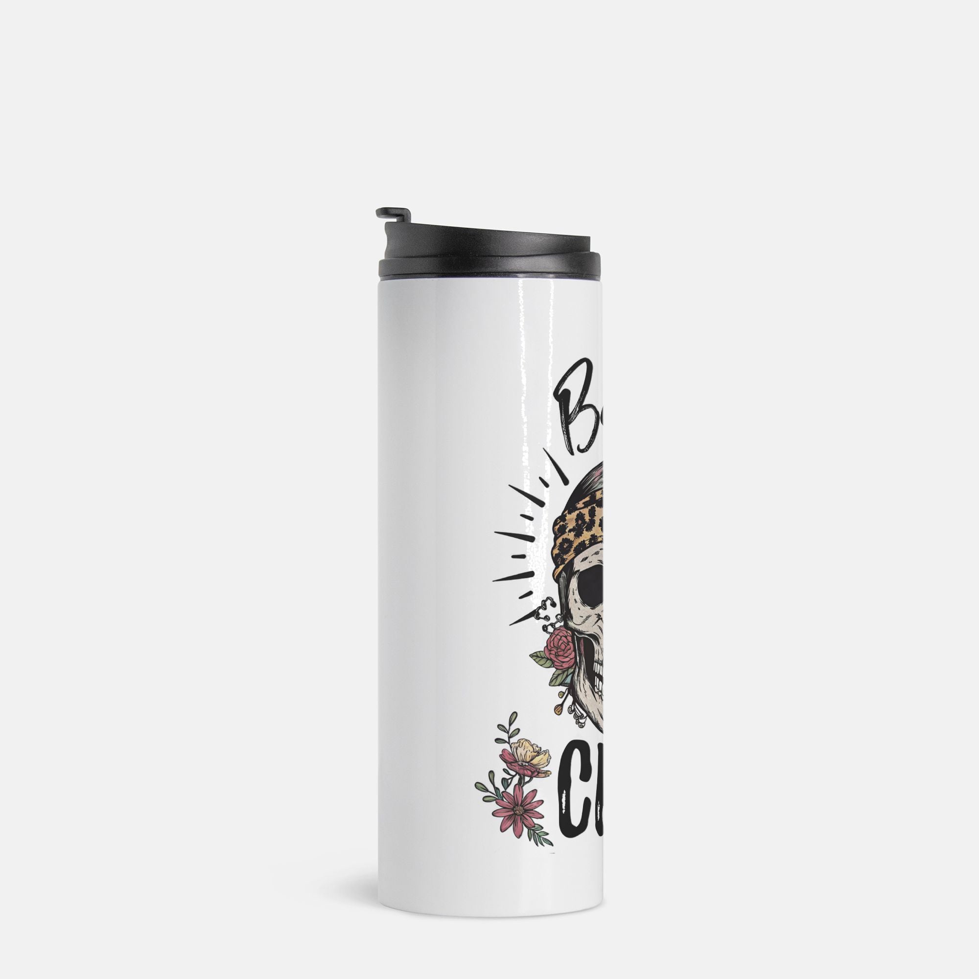 White tumbler with black lid featuring a skull and floral design on a white background