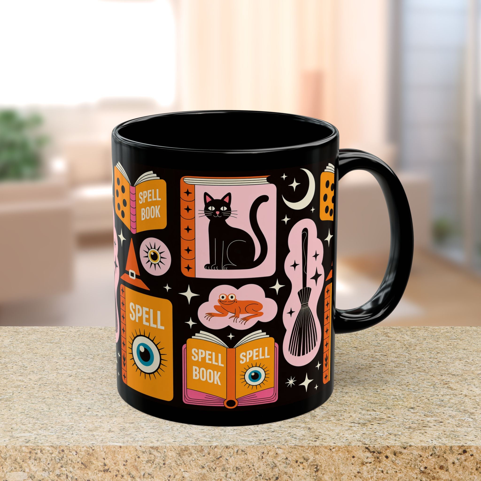 Black mug with witch-themed design on a table