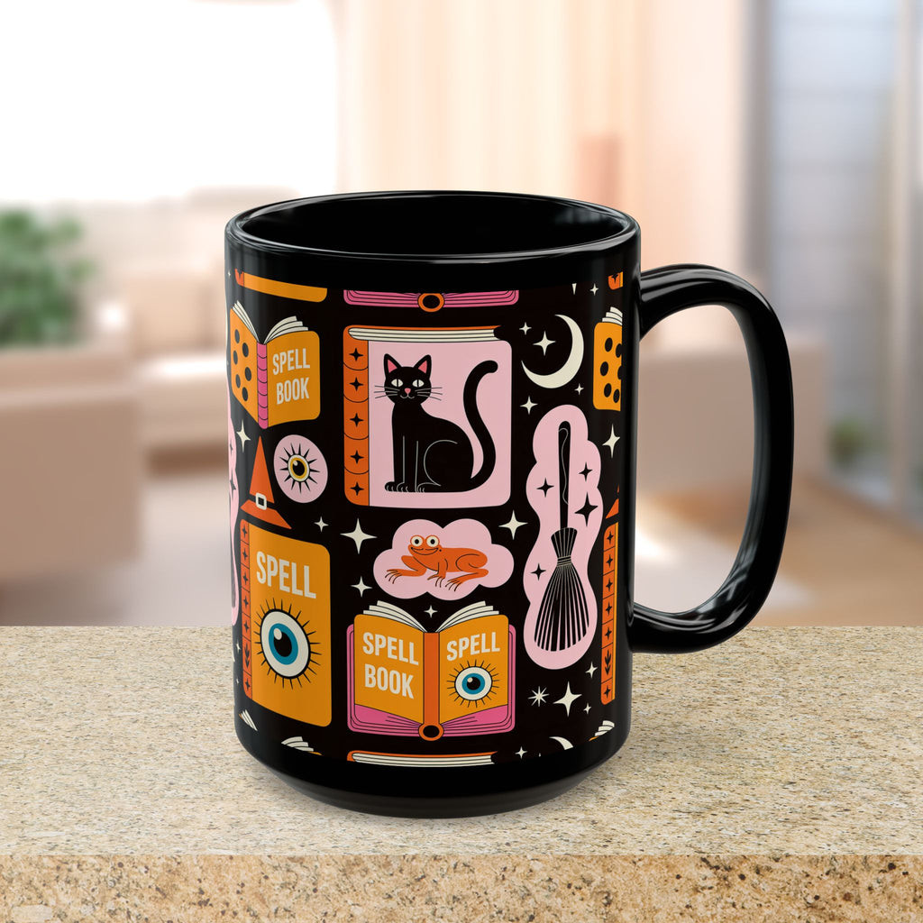 Black mug with colorful witch-themed design on a table