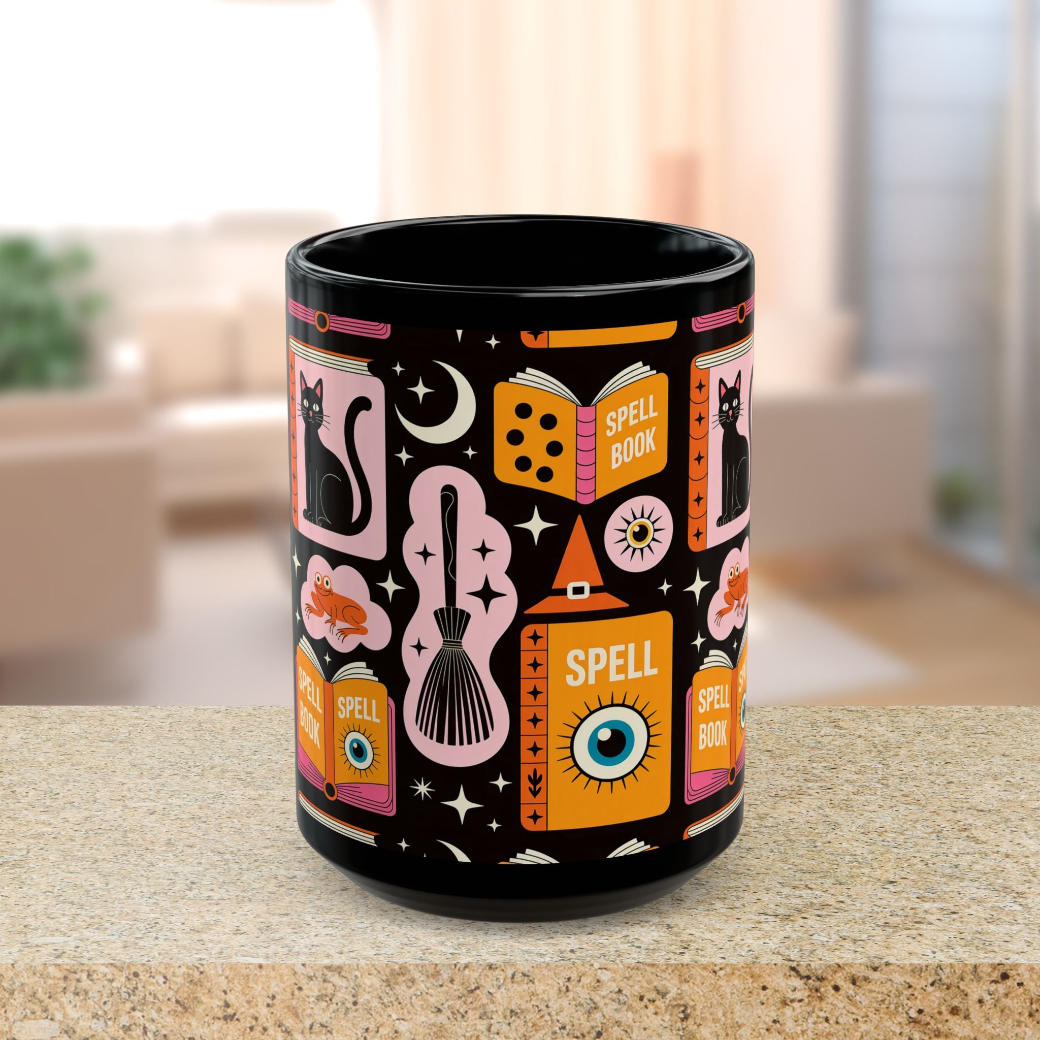 Black mug with colorful witch-themed design on a table