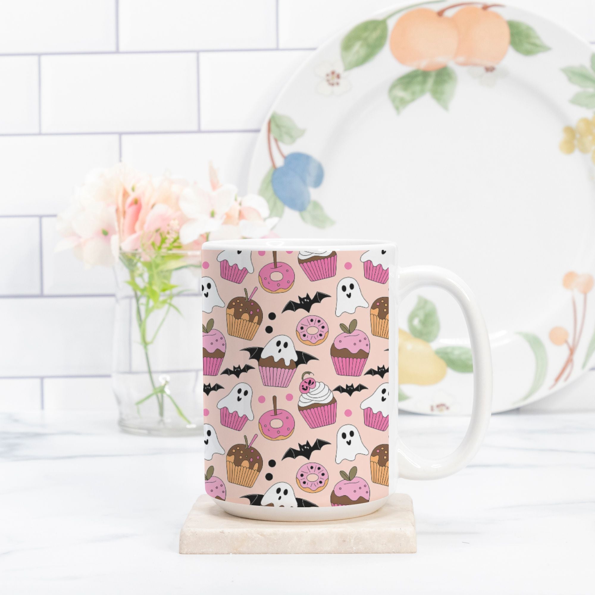 Mug with Halloween-themed design on a white surface with a blurred background