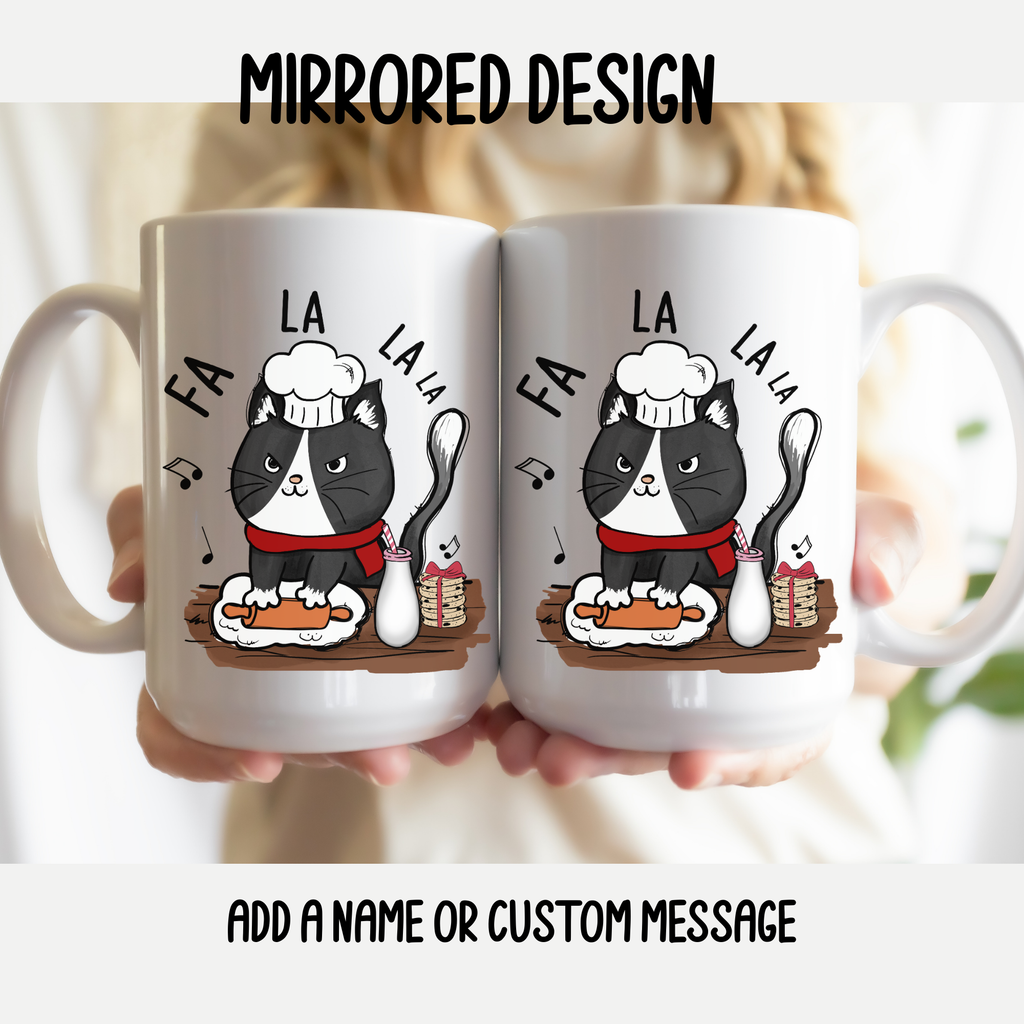 Two mugs with a mirrored design of a black cat character and text, held together.