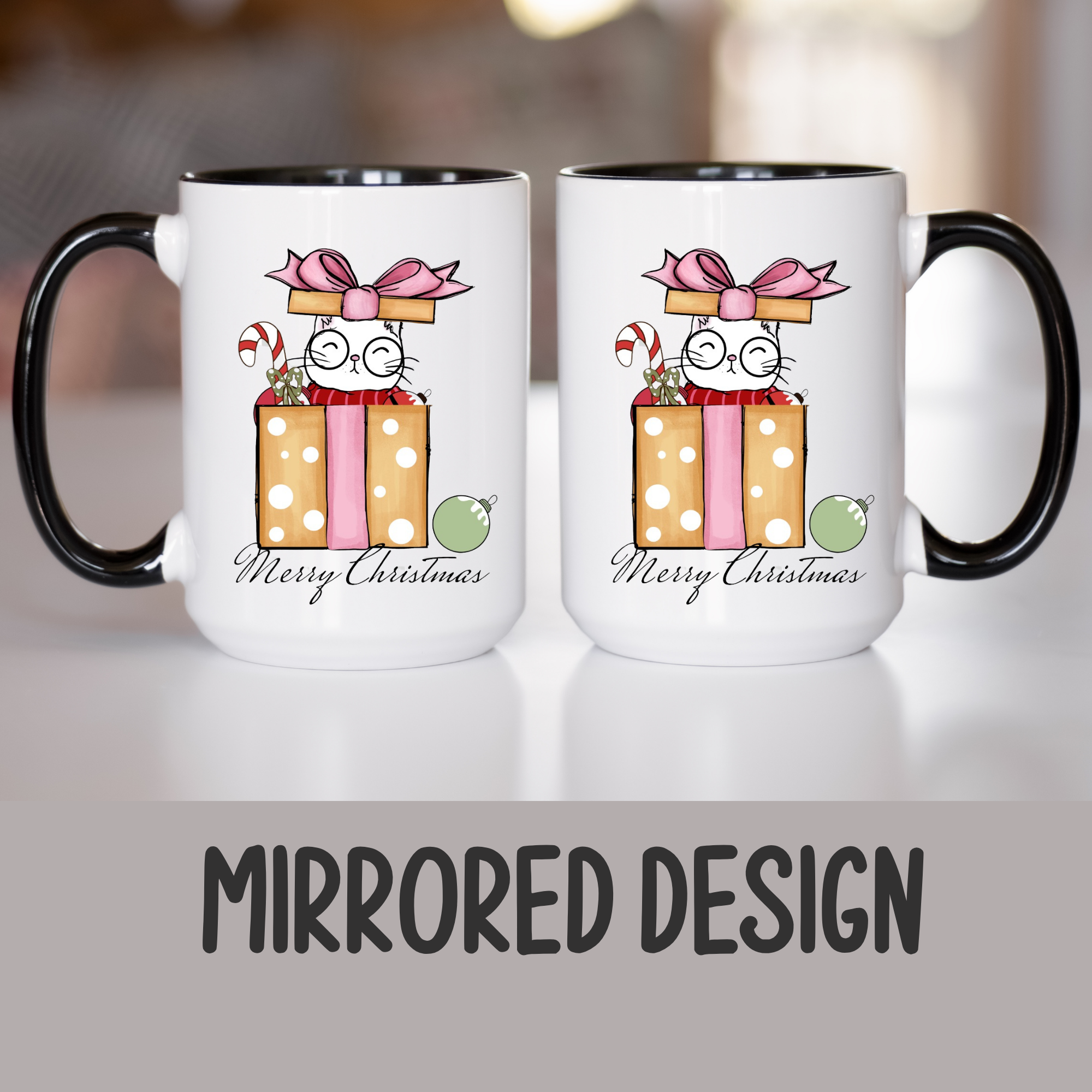Two white mugs with black handles featuring a mirrored Cat in Christmas present design on a light background.