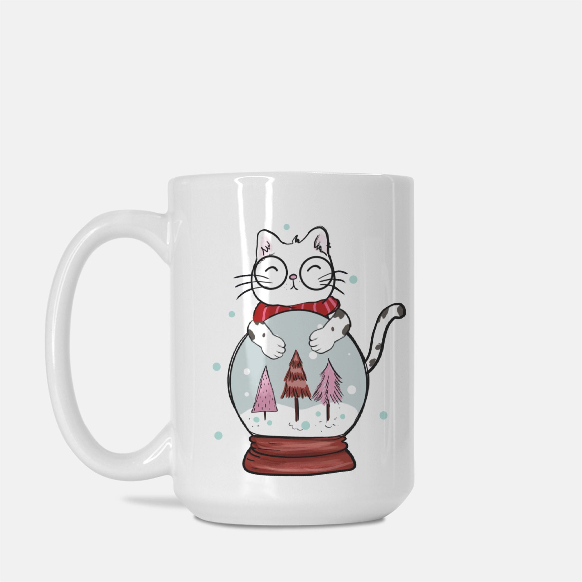 Mug with a design of a cat inside a snow globe with Christmas trees on a white background