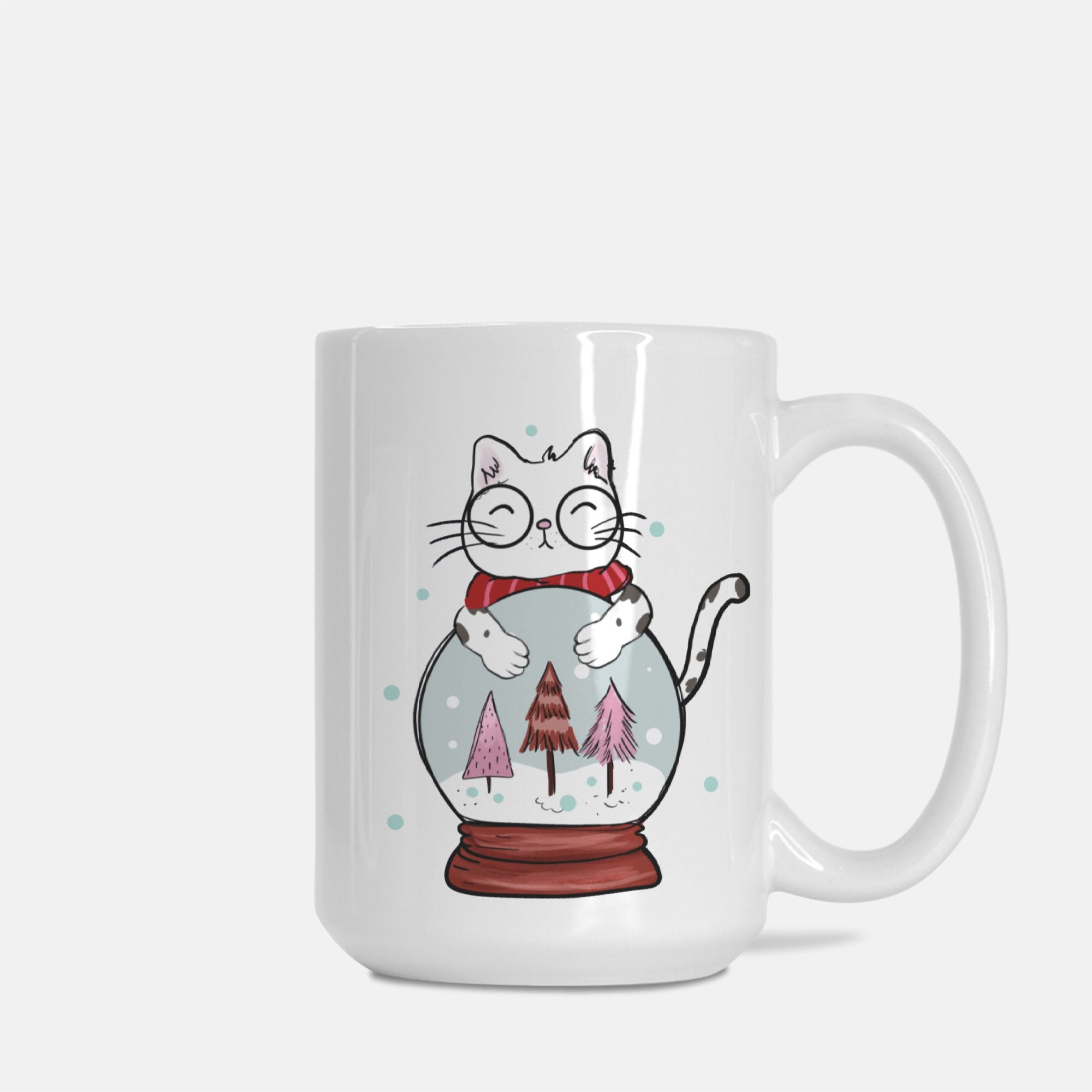 Mug with a design of a cat holding a snow globe with trees on a white background