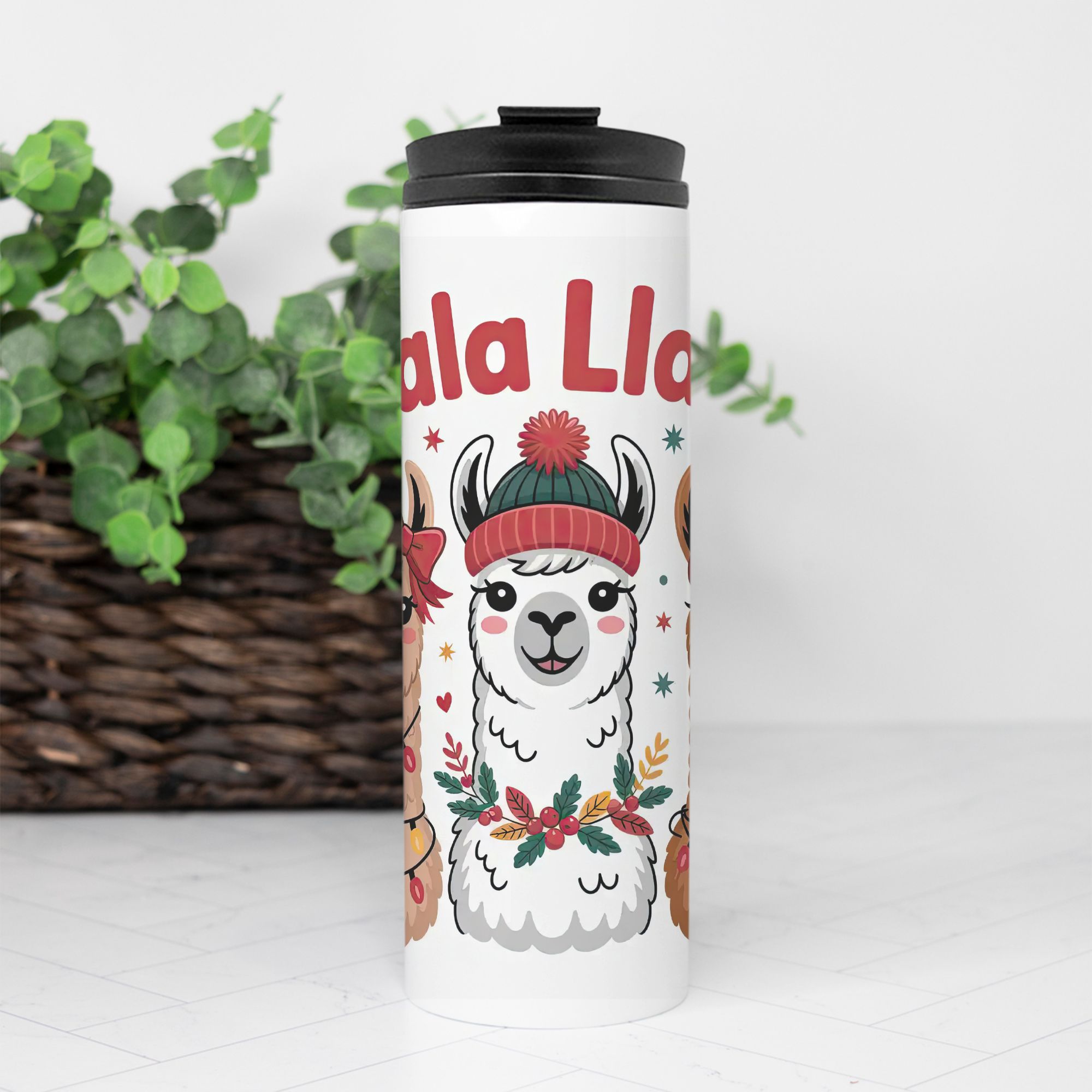 Tumbler with a Festive llama design and 'Falala Llama' text on a white background