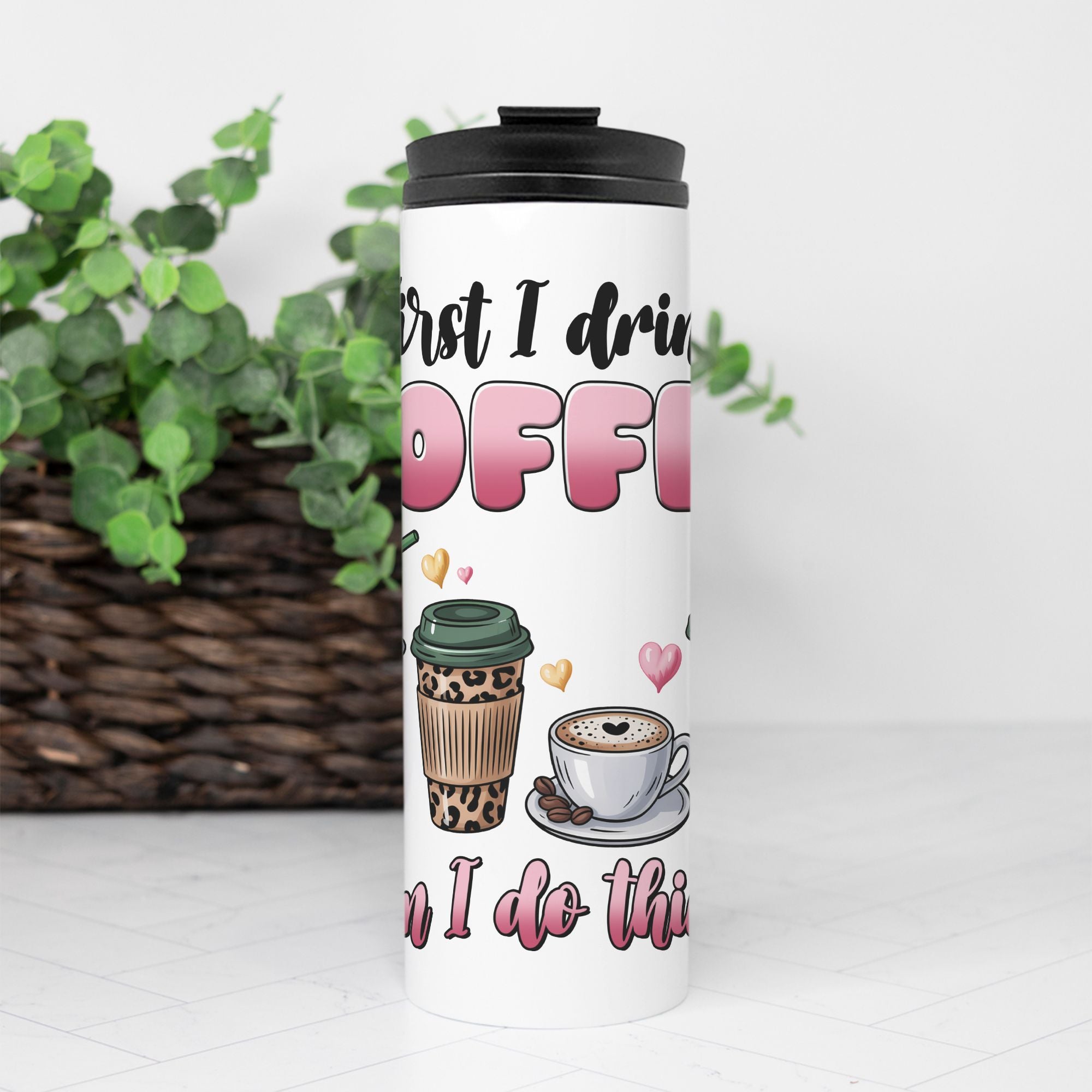 Tumbler with coffee-themed design and text on a white background