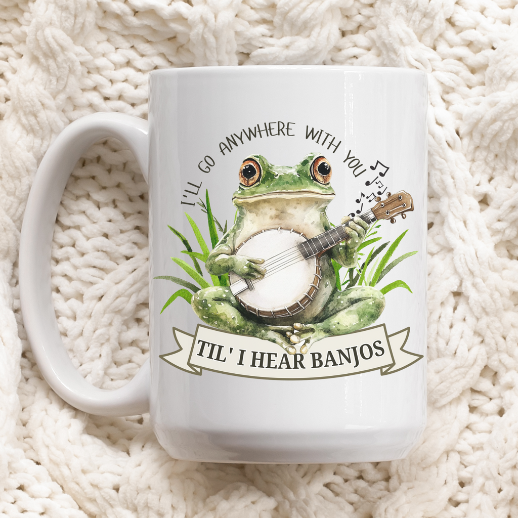 White mug with a frog playing banjo design on a textured white background