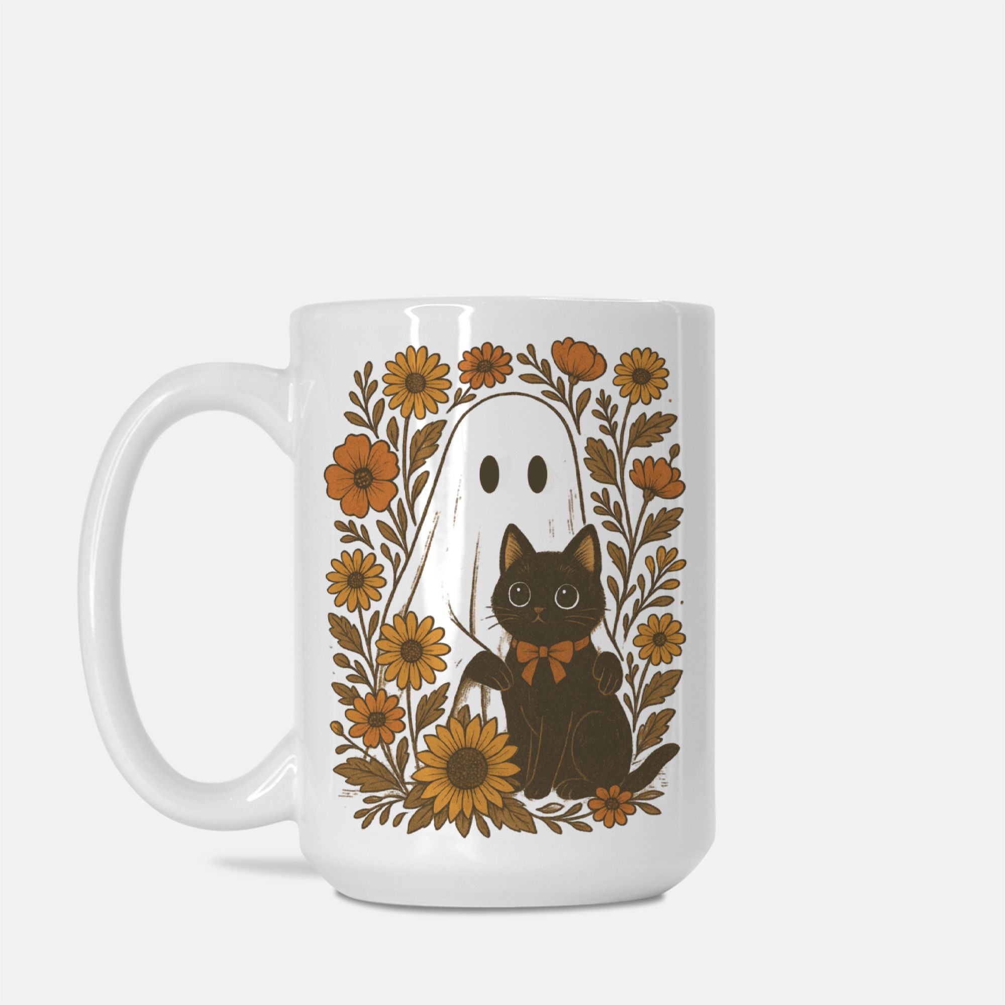 Mug with a design of a black cat, ghost, and flowers on a white background
