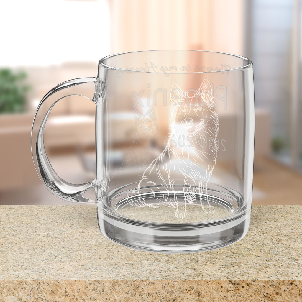 Clear glass mug with a Belgian Shepherd dog design on a wooden surface