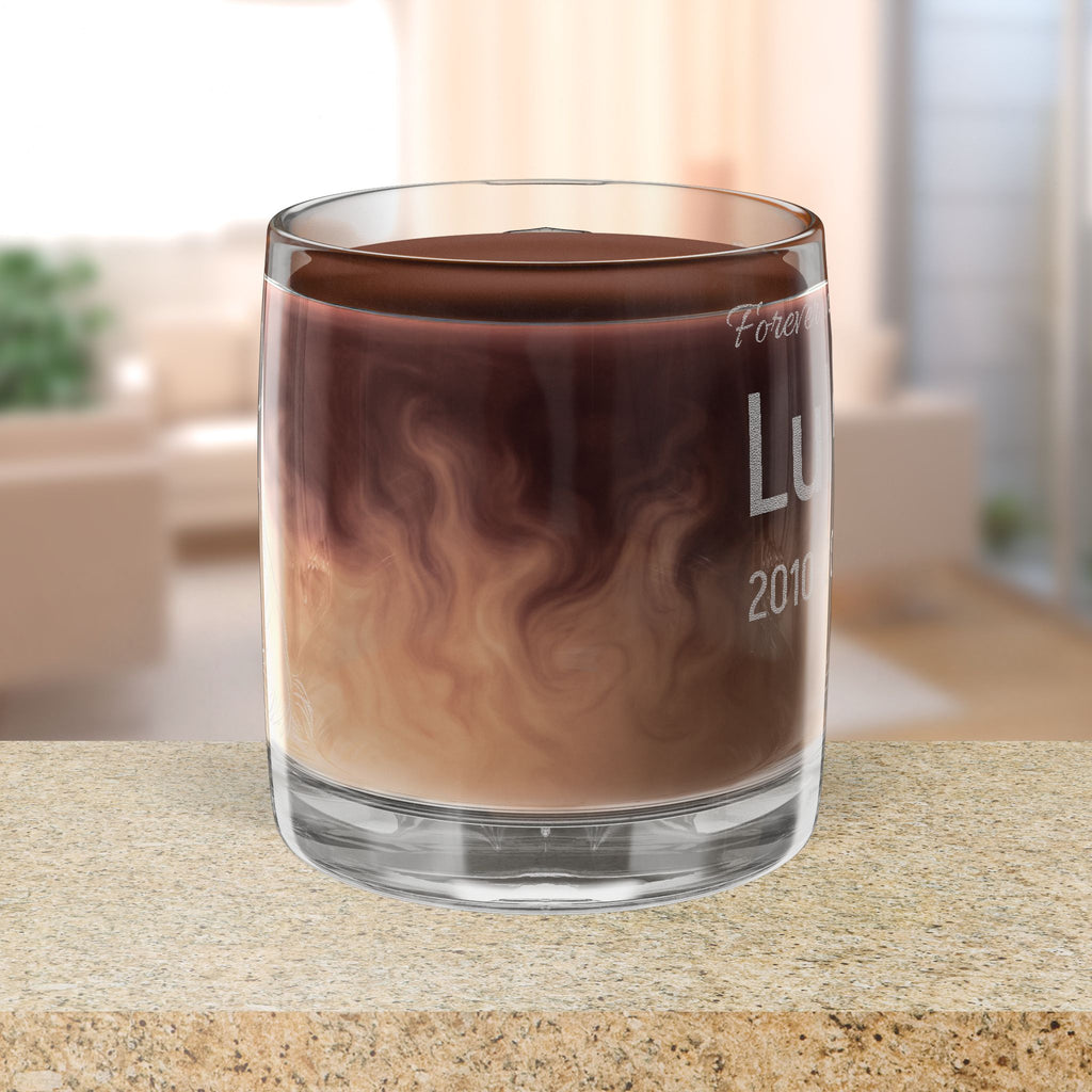 Glass with layered liquid on a blurred indoor background