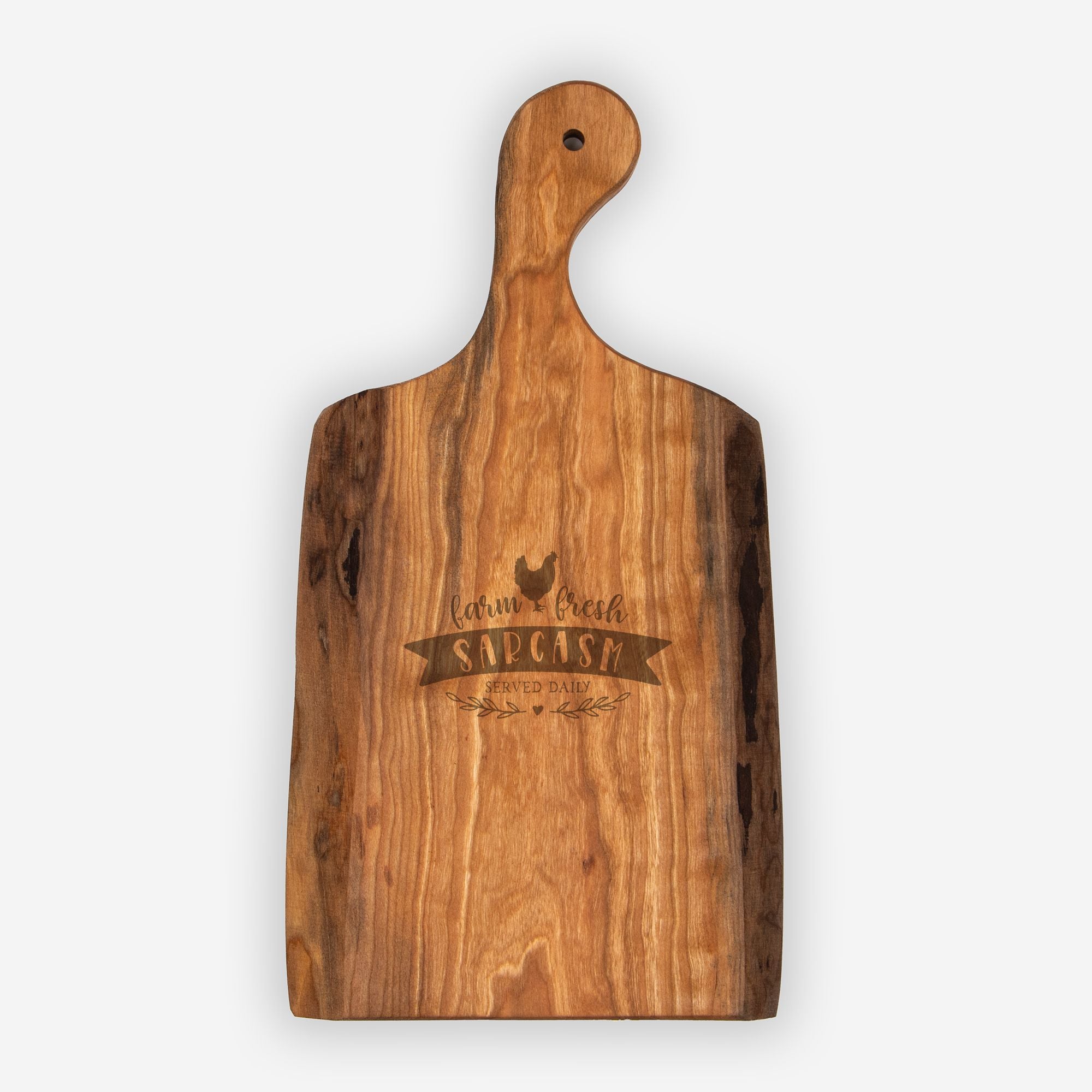 Wooden cutting board with engraved text on a white background