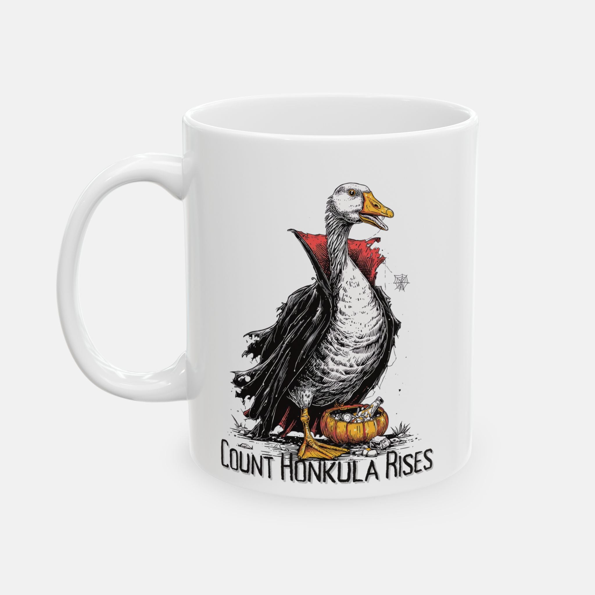 White mug with a vampire goose illustration and text 'Count Honkula Rises' on a white background