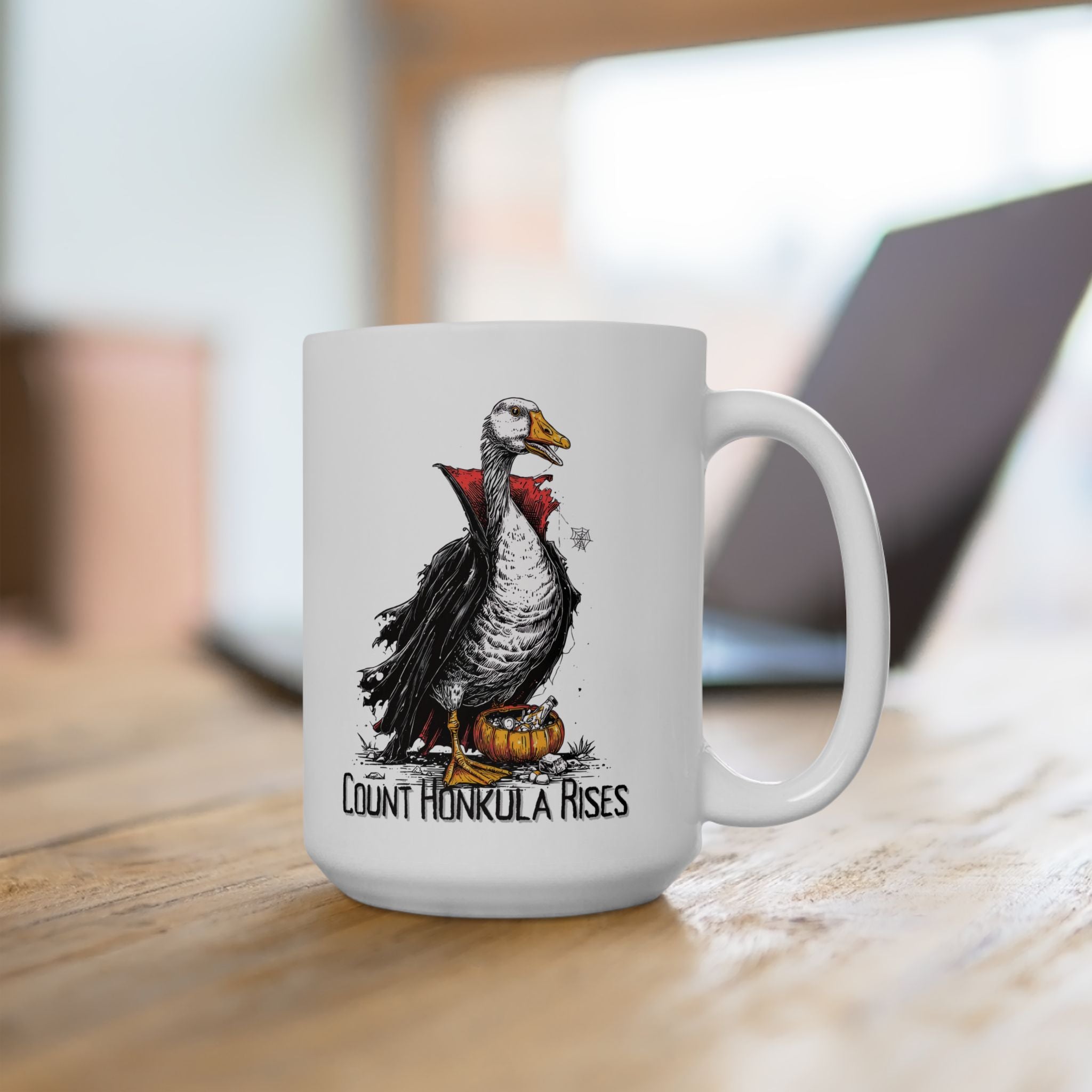 White mug with a goose illustration and text on a wooden surface