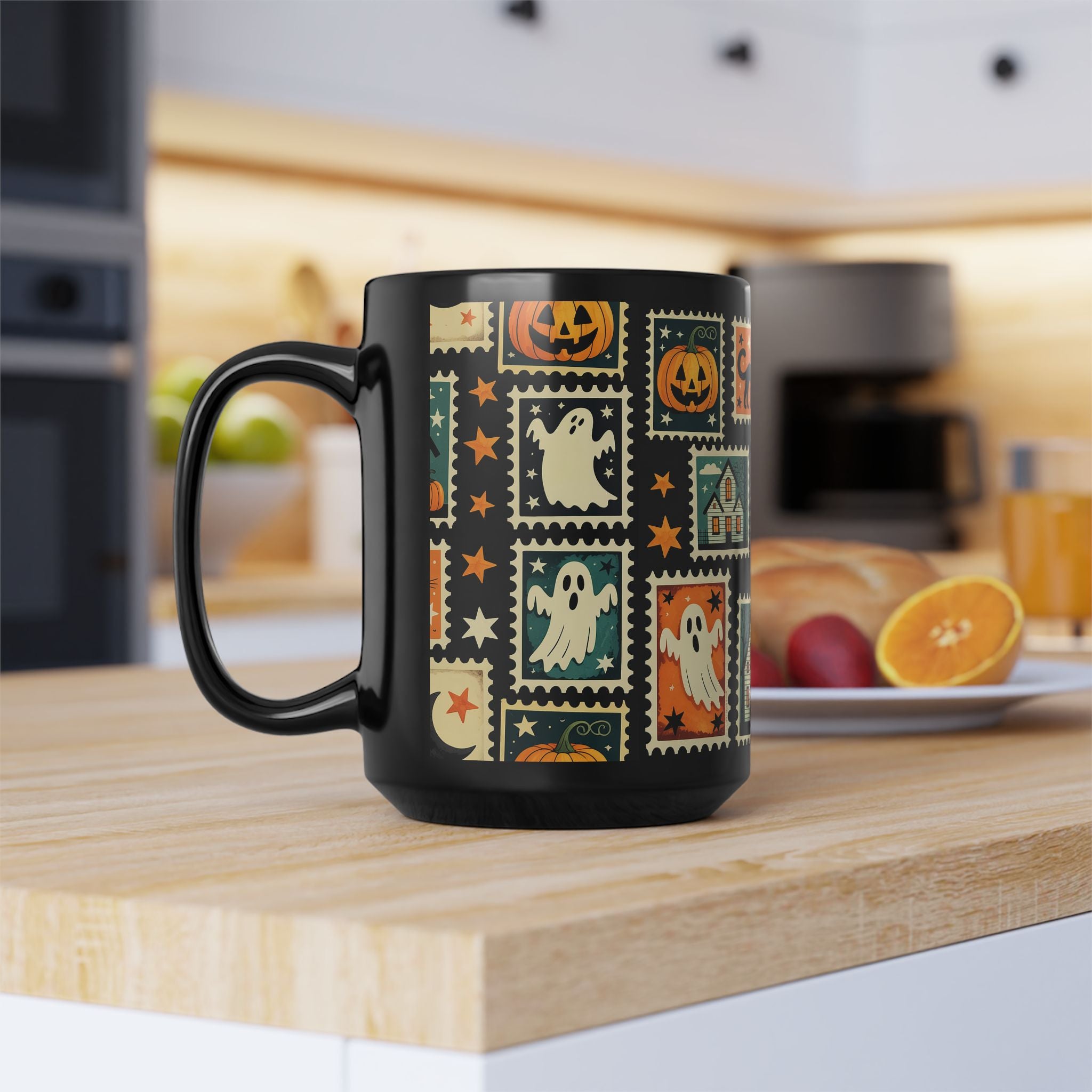 Black mug with Halloween-themed design on a kitchen counter