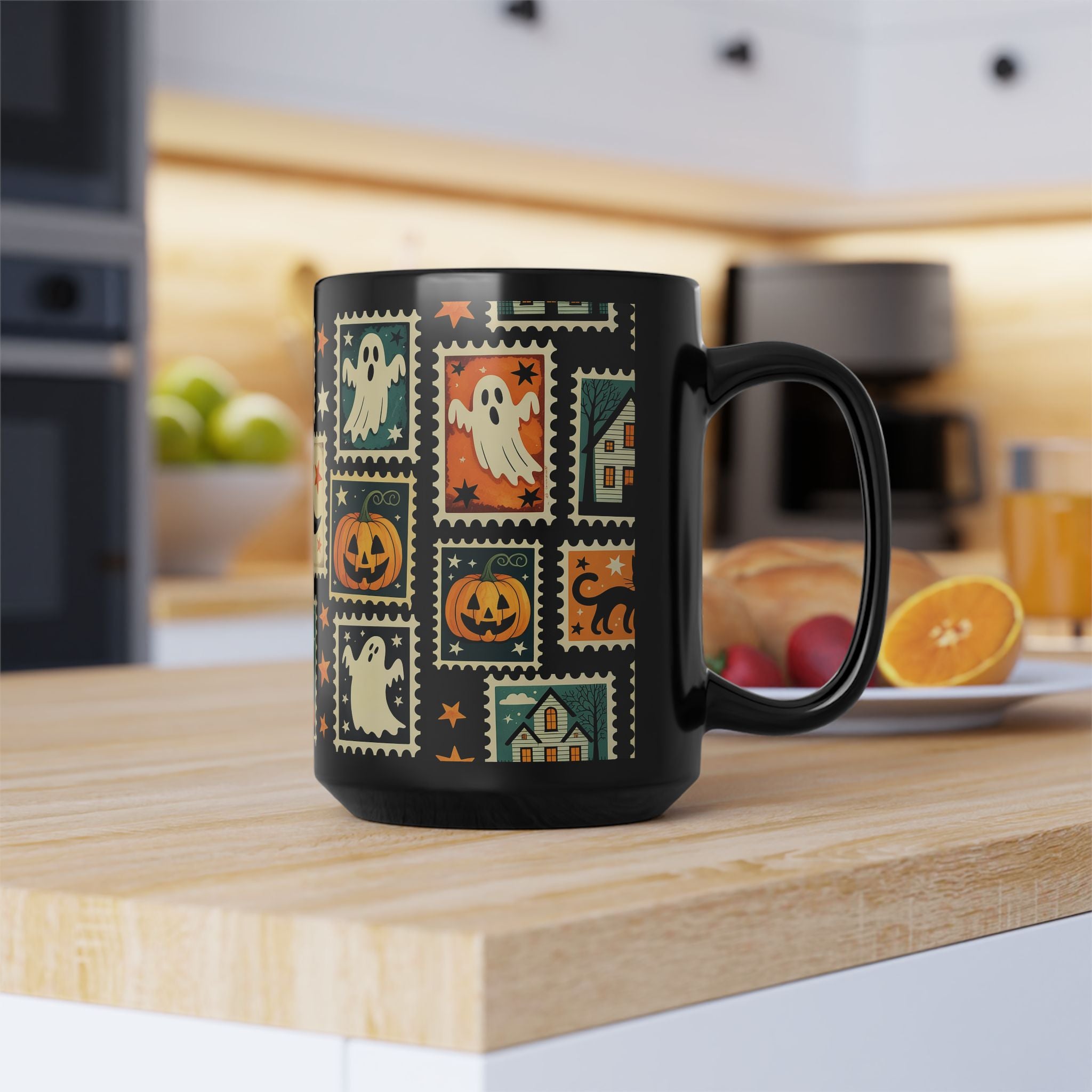 Black mug with Halloween-themed design on a kitchen counter