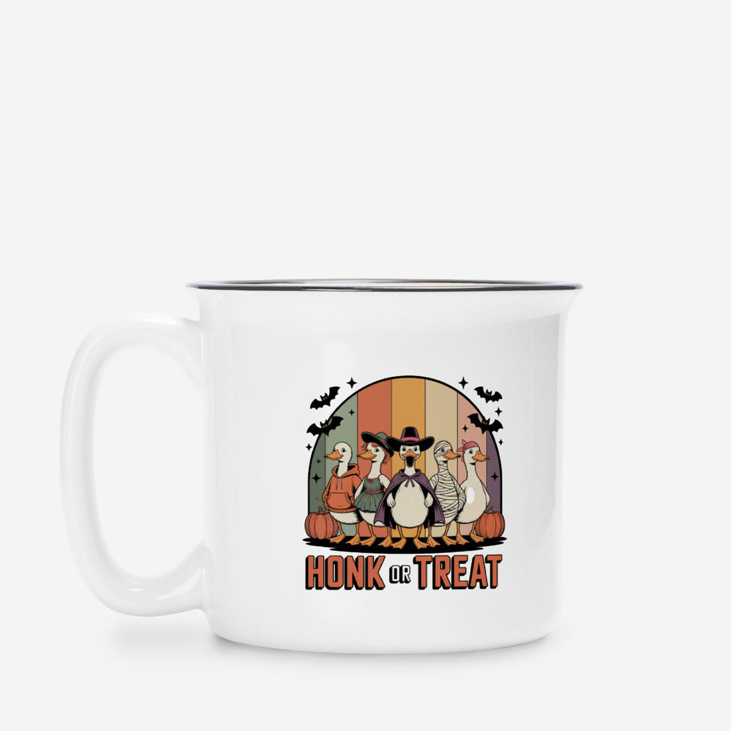 White camp mug with a graphic design of cartoon character geese and text 'Honk or Treat' on a white background.