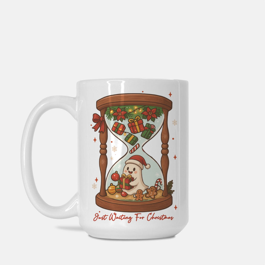 White mug with Christmas-themed design featuring a ghost in a Santa hat and candy cane, with text 'Just Waiting For Christmas'.