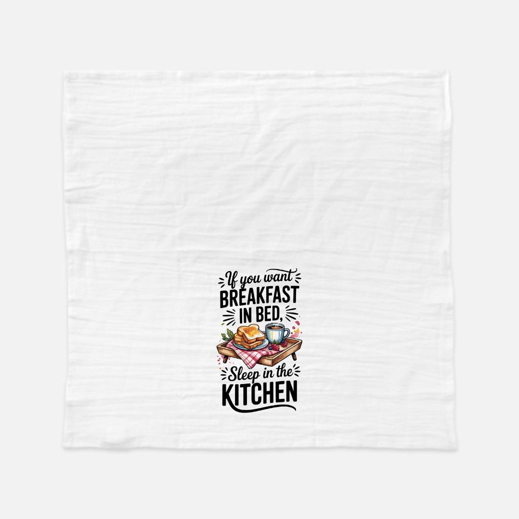 White towel with humorous kitchen-themed text and graphics on a white background