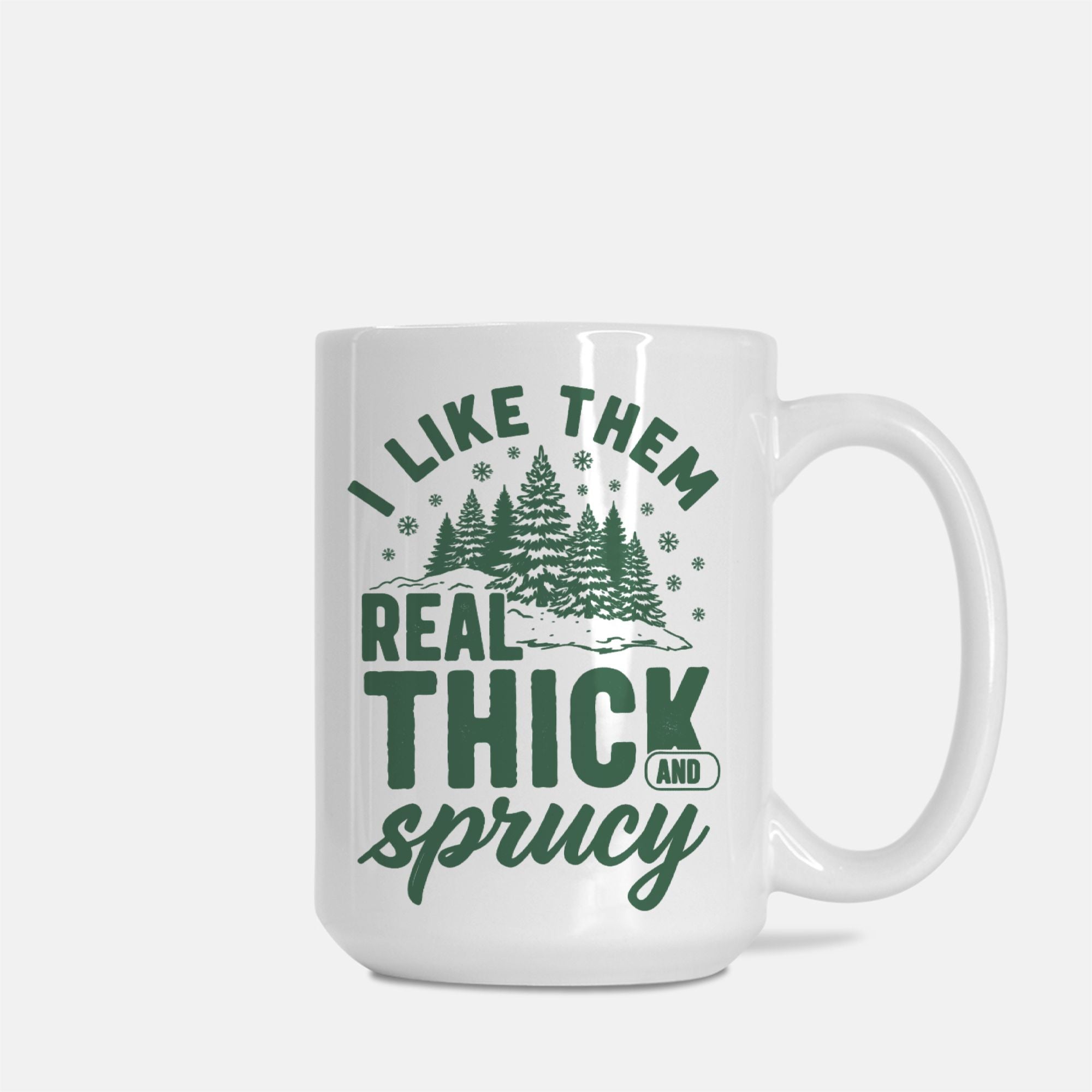 White mug with green text and forest design on a white background