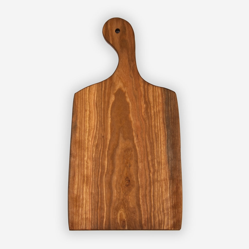 Wooden cutting board with a handle on a white background