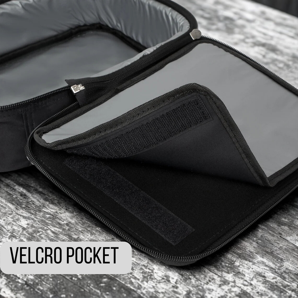 Black velcro pocket on a gray surface with 'VELCRO POCKET' text label.