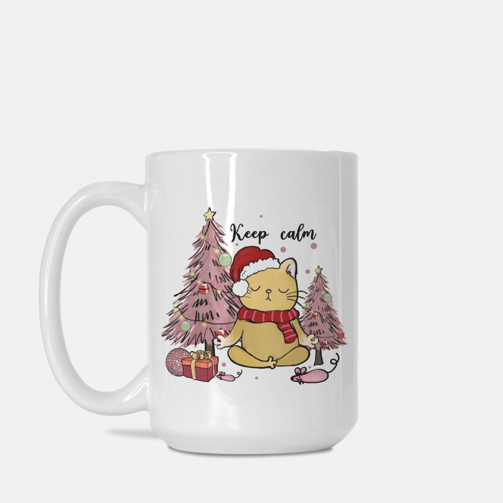 White mug with a Christmas-themed design featuring a cat, trees, and the text 'Keep calm'.