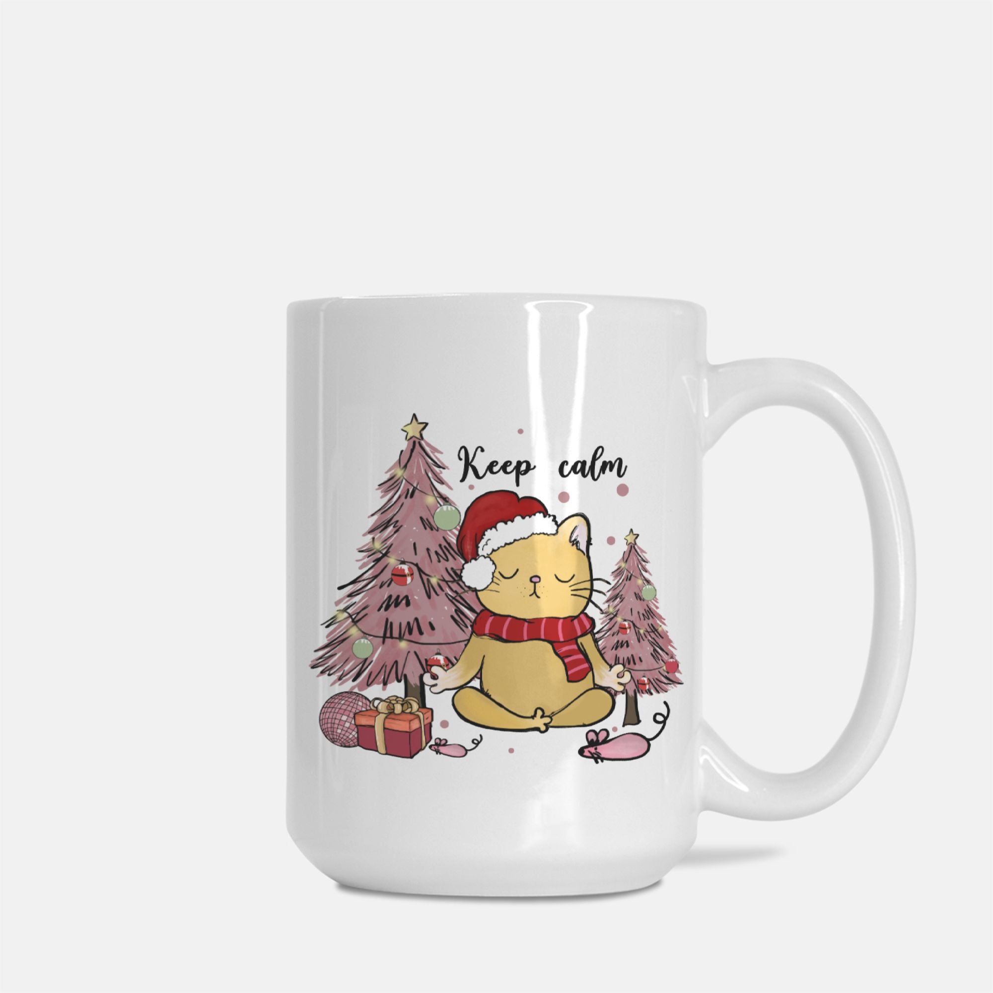White mug with a Christmas-themed design featuring a cat, trees, and the text 'Keep calm'.