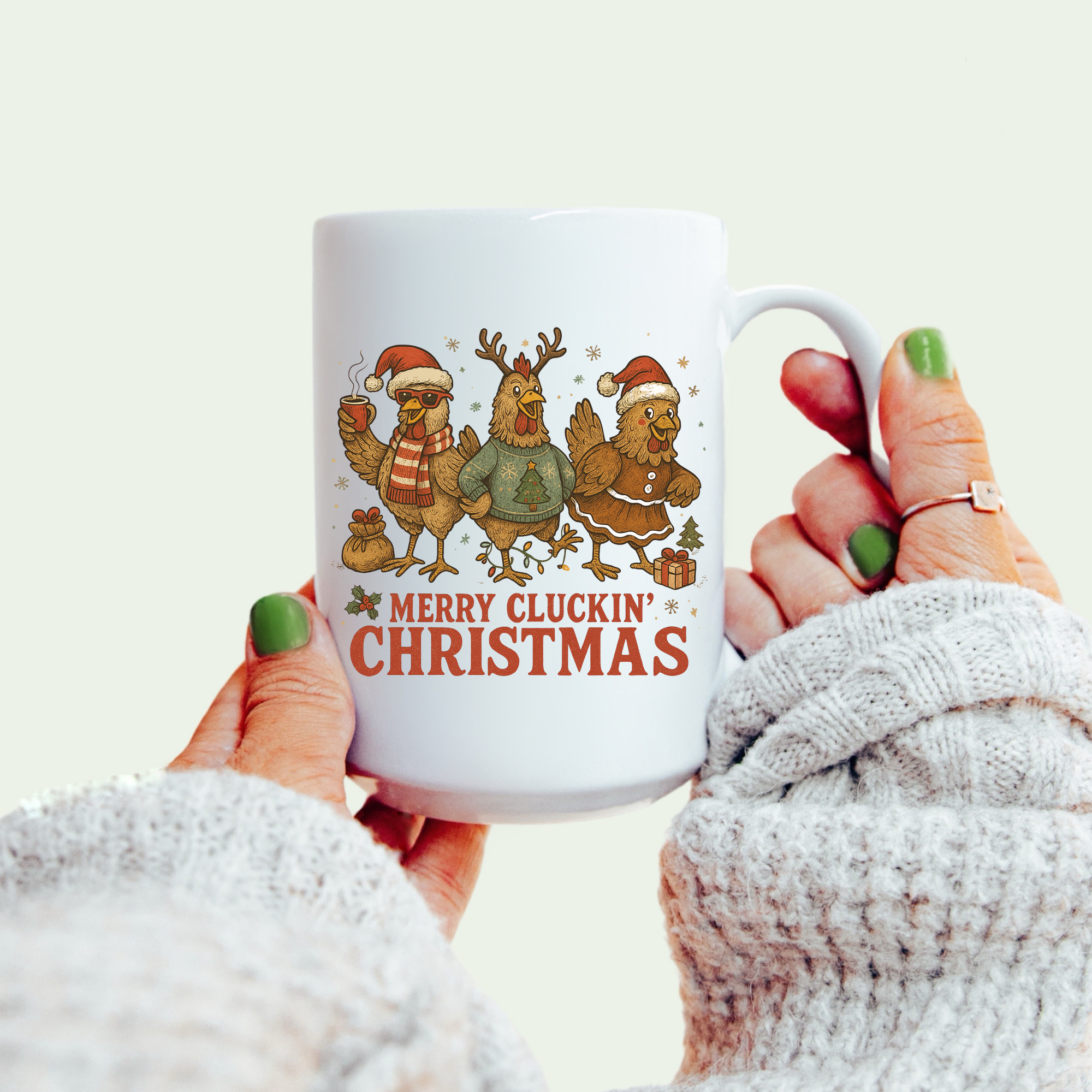 White mug with chickens wearing Christmas hats and text ' Merry Cluckin' Christmas'.