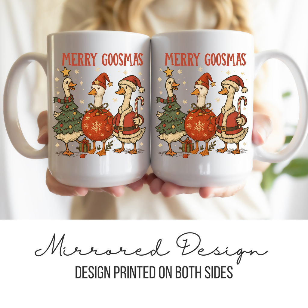 Two white mugs with a Christmas design of geese and text 'Merry Goosmas' held together.