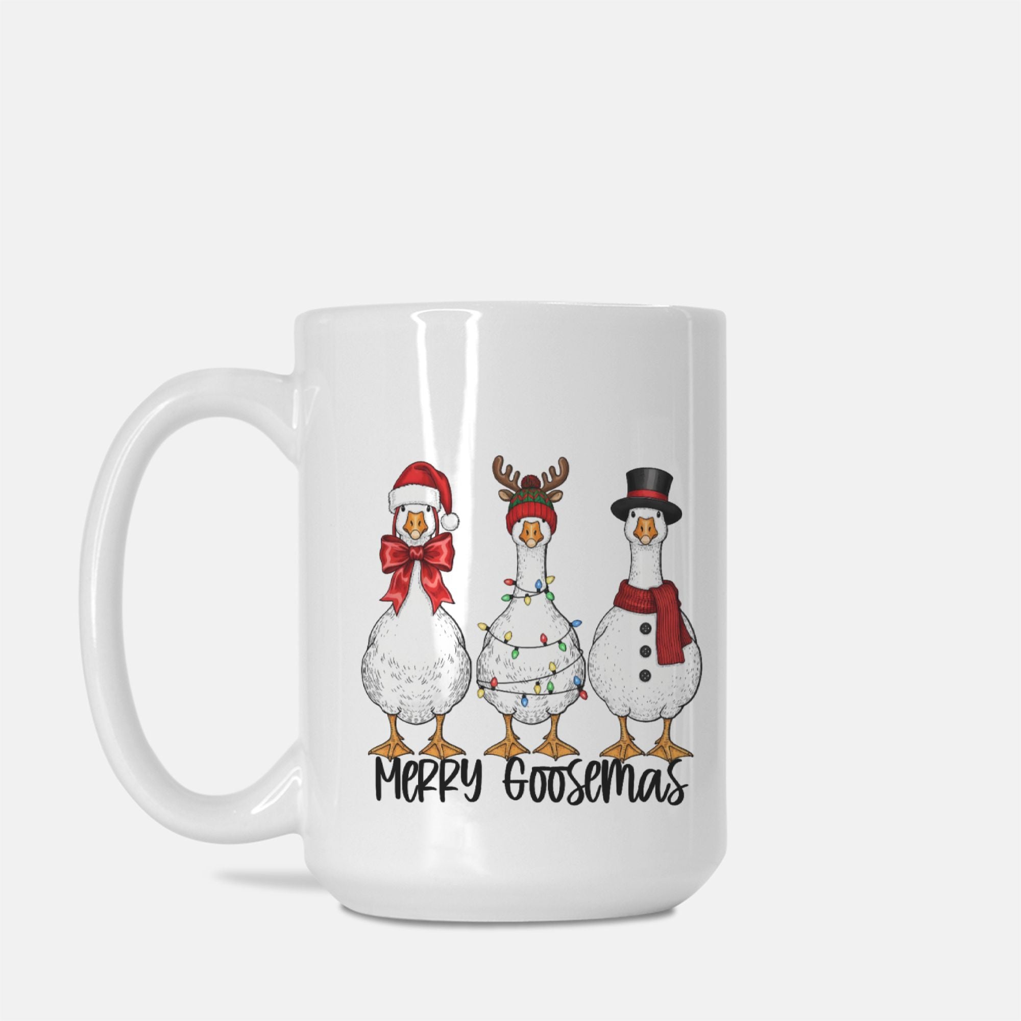 White mug with Christmas-themed geese illustrations and text on a white background
