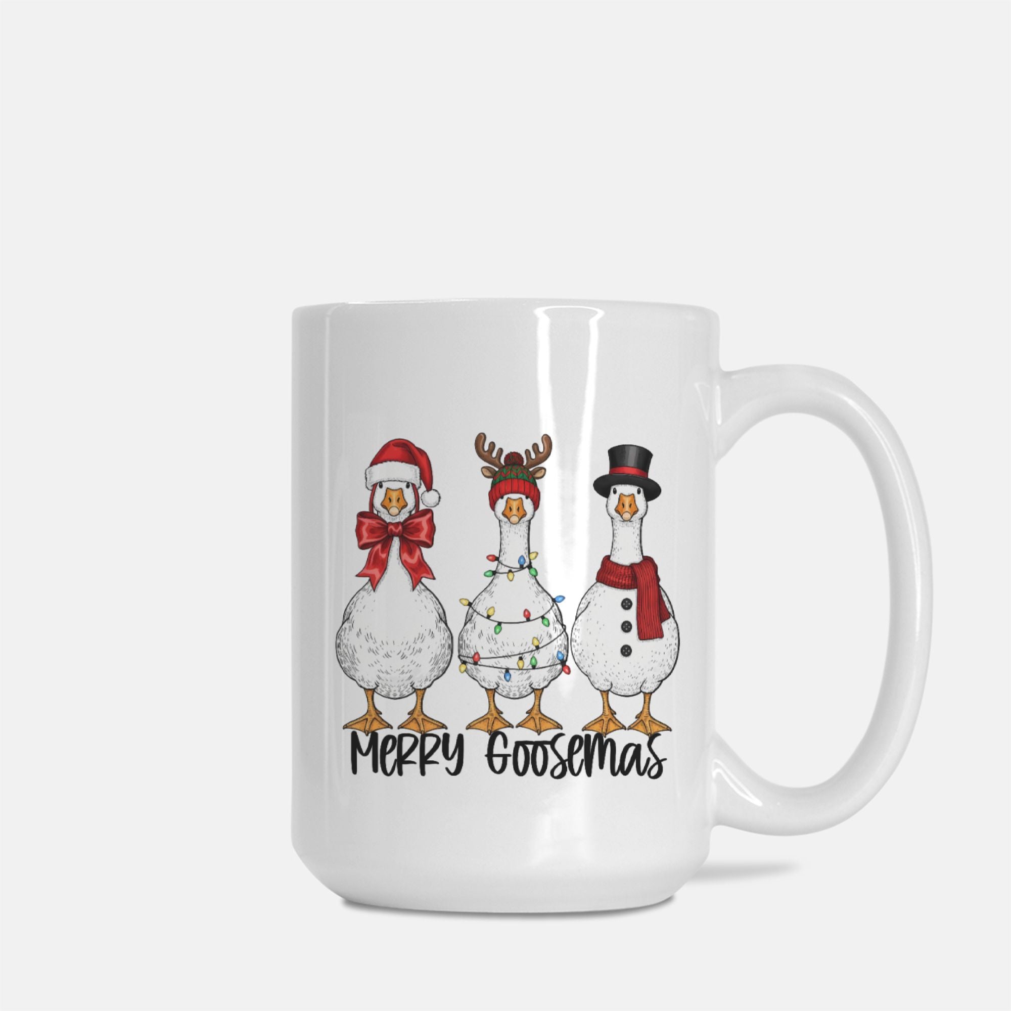 White mug with Christmas-themed goose illustrations and text on a white background