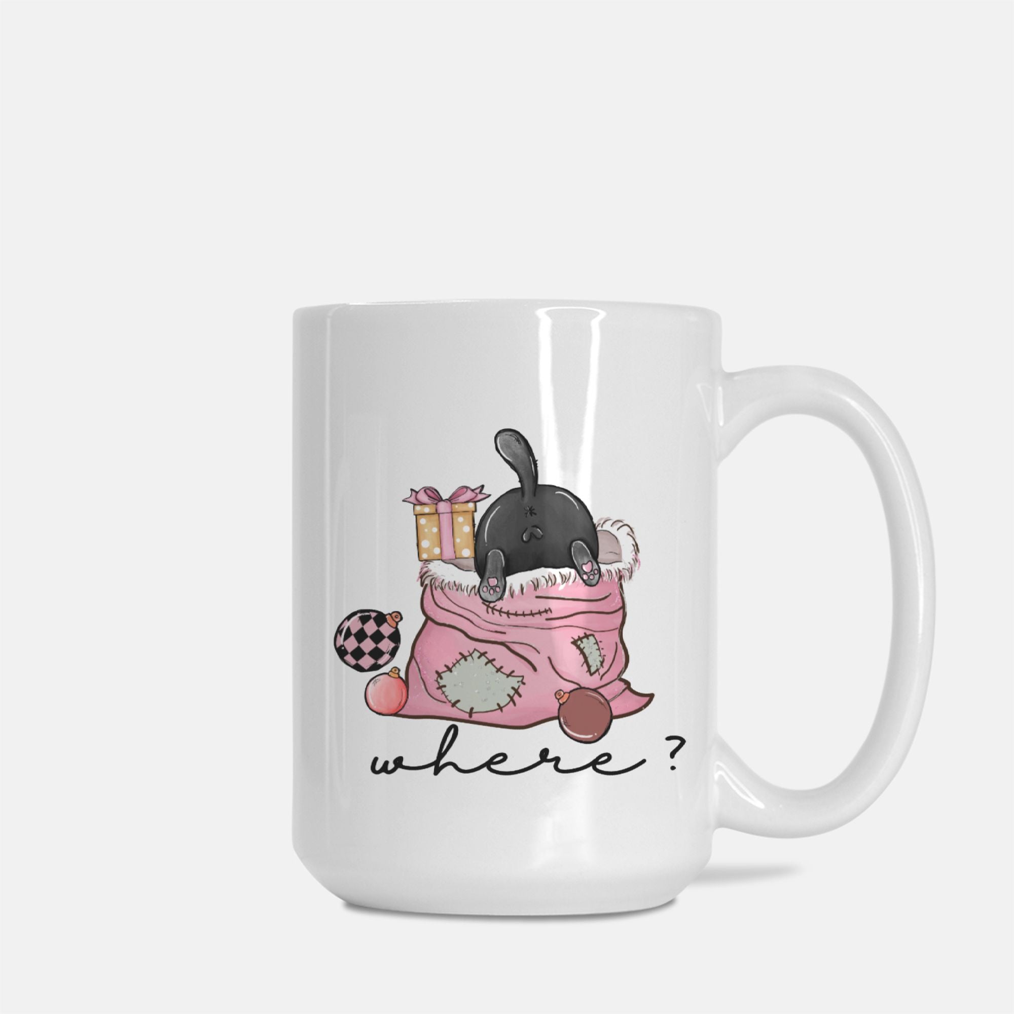 White mug with cartoon character cat digging in a Christmas bag and text 'where?' on a white background