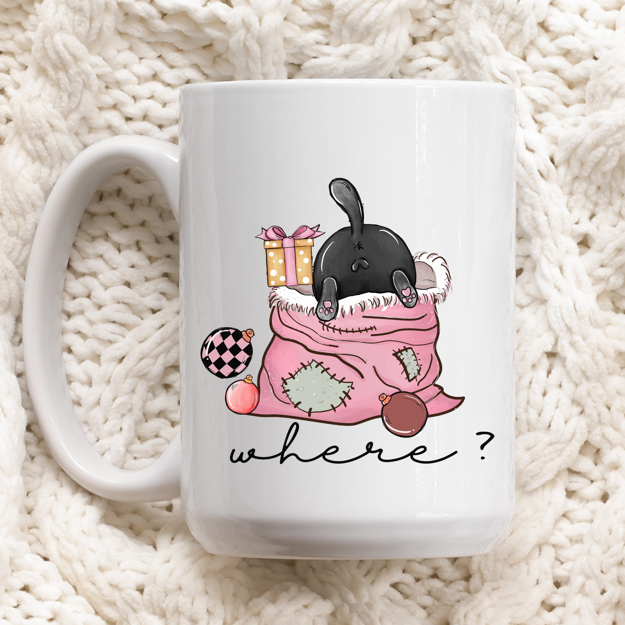 White mug with a black cat illustration and 'WHAT?' text on a textured white background