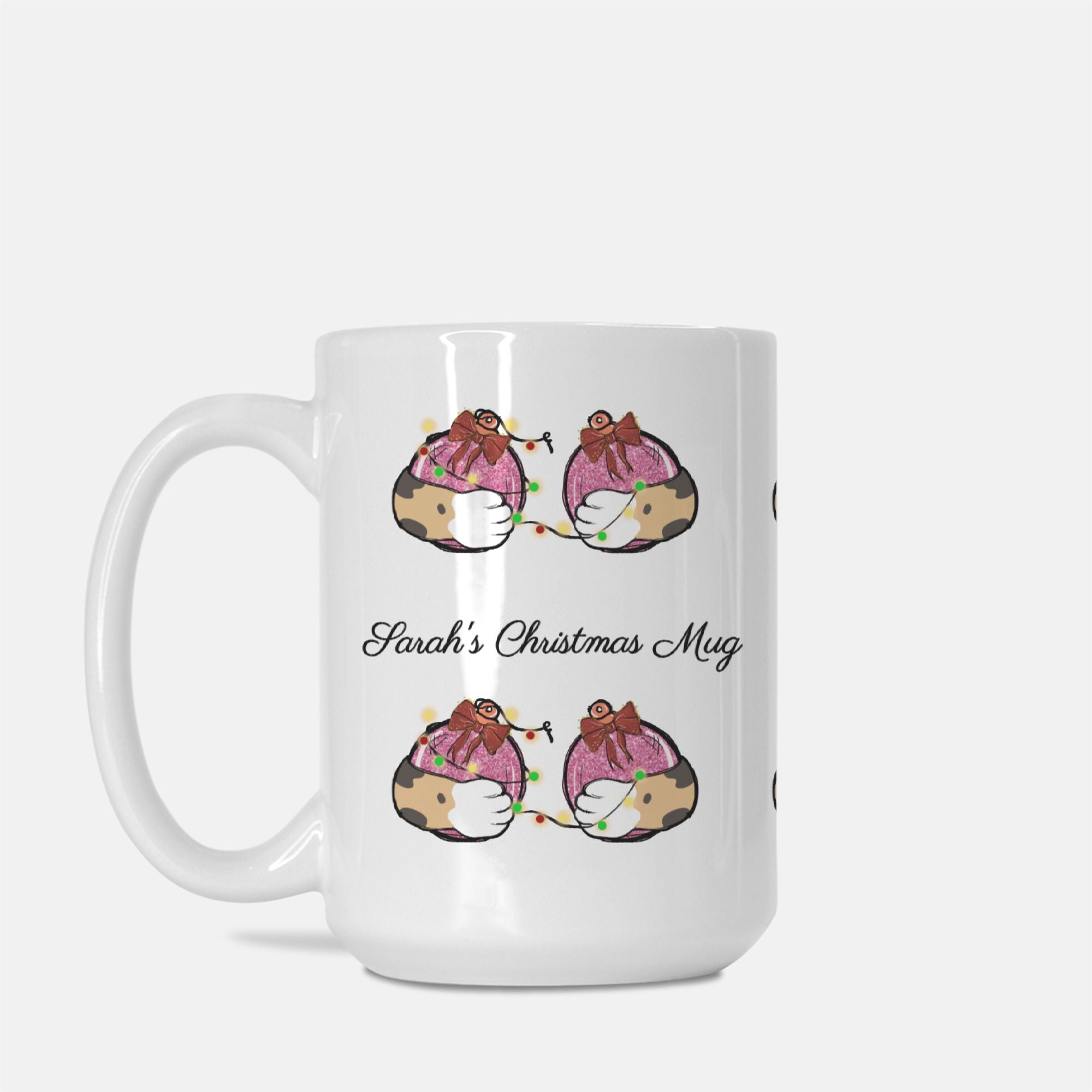 White mug with Christmas-themed design and 'Sarah's Christmas Mug' text on a white background