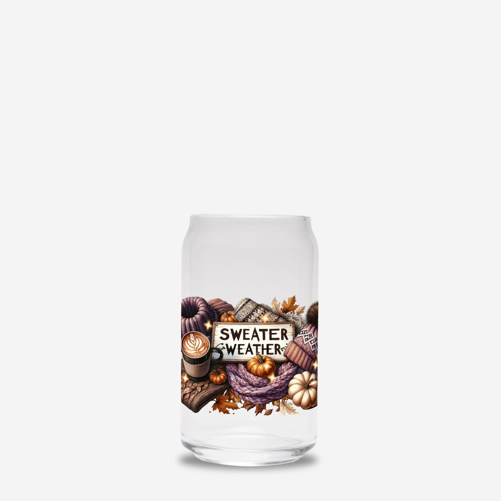 Glass tumbler with 'Sweater Weather' design featuring pumpkins, scarves, and a coffee cup on a white background.