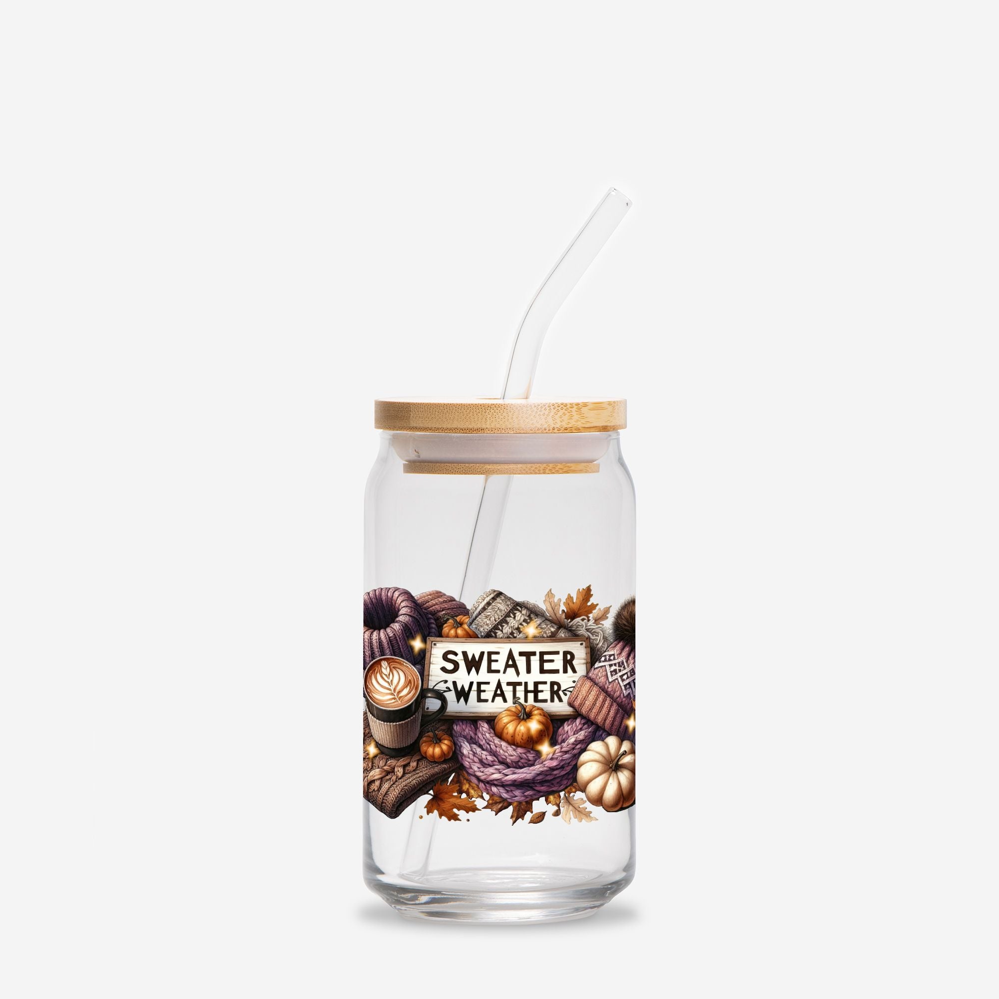 Clear tumbler with autumn-themed design and 'Sweater Weather' text on a white background
