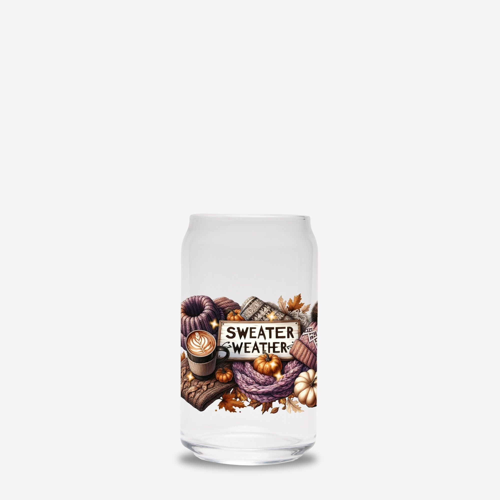 Glass tumbler with autumn-themed design and 'Sweater Weather' text on a white background