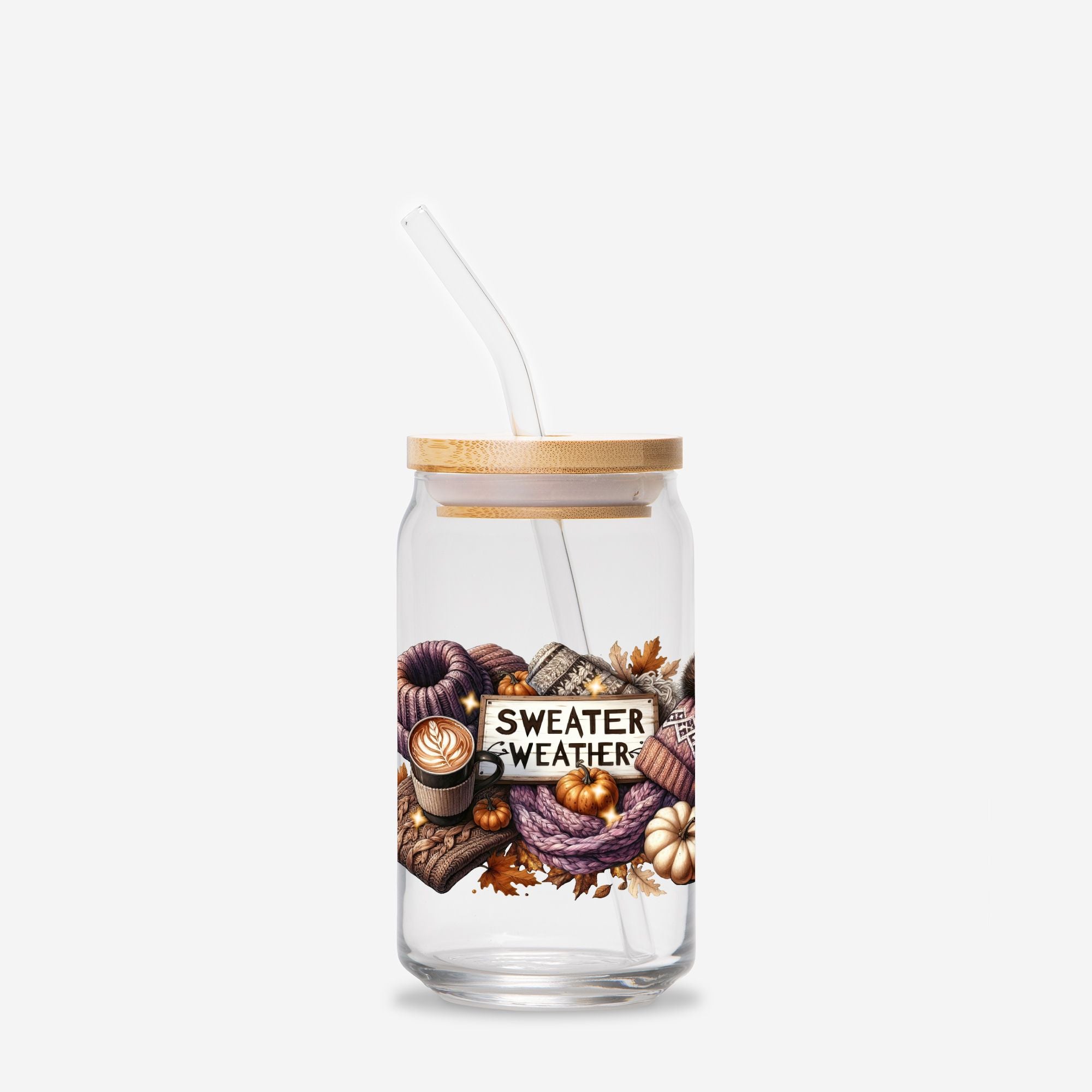 Glass tumbler with straw and wooden lid featuring autumn-themed design and 'Sweater Weather' text.