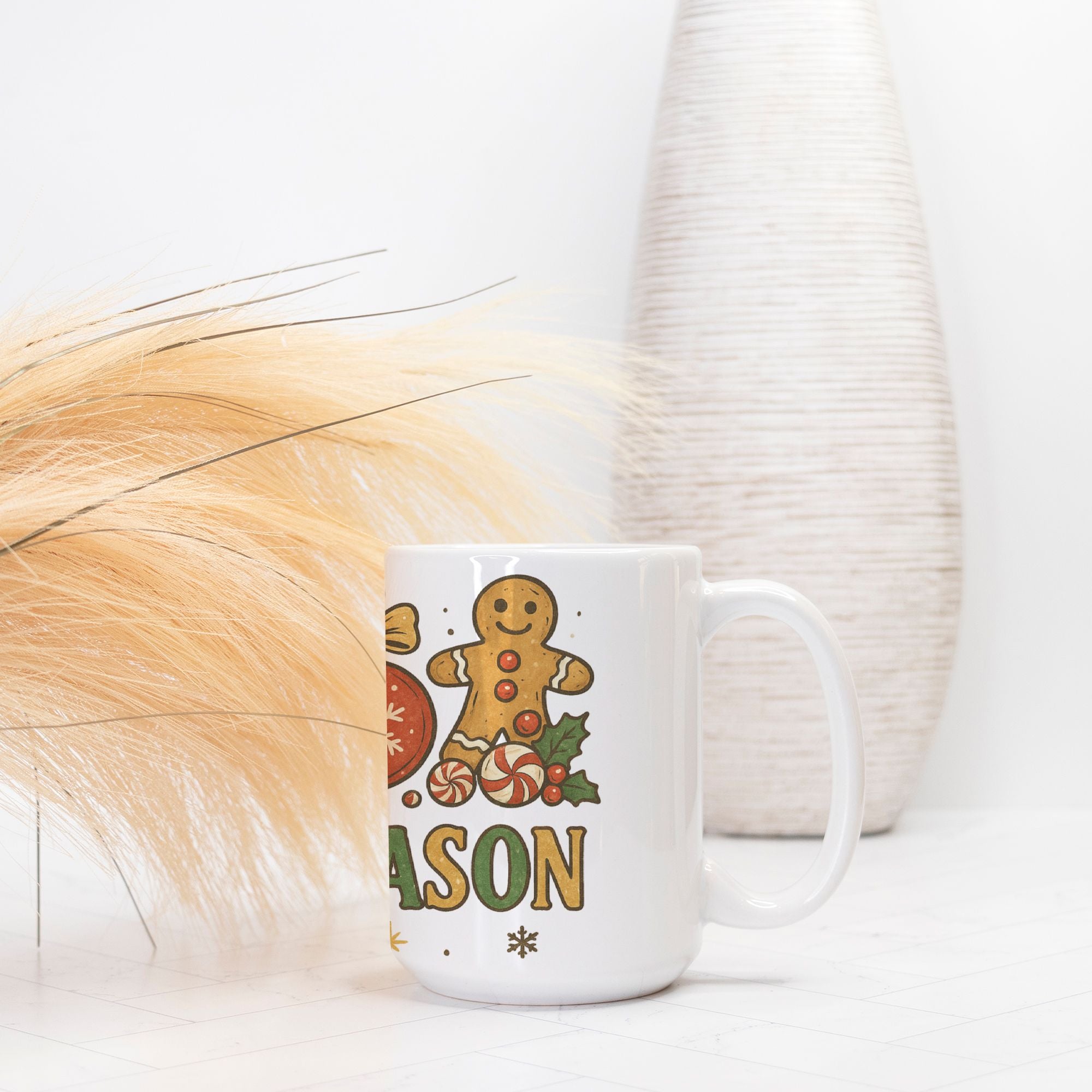White mug with gingerbread design and 'Merry Christmas' text on a white surface.