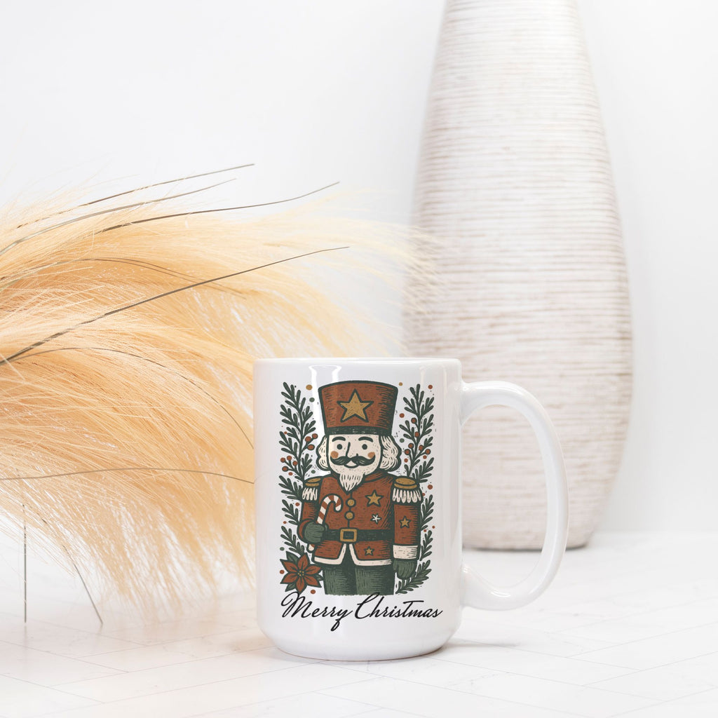 White mug with Christmas design featuring a nutcracker and wreath on a white background