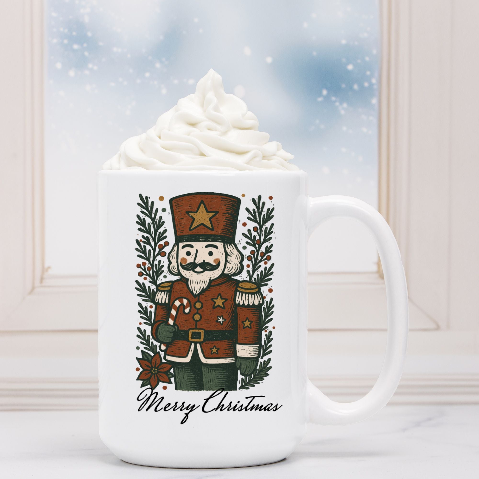 White mug with a Christmas nutcracker design, filled with hot chocolate and whipped cream, against a snowy window background.
