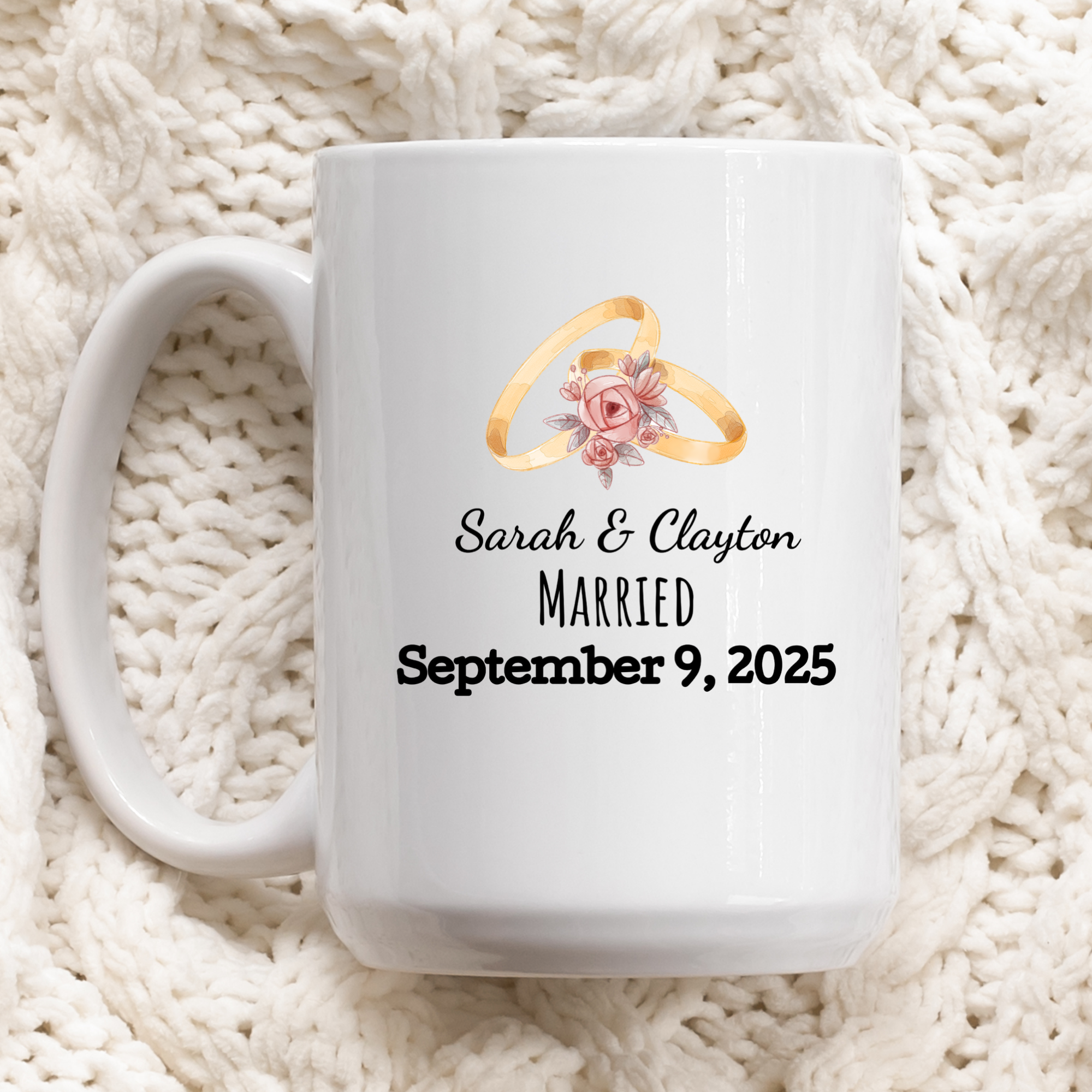 White mug with personalized text and ring design on a textured white surface