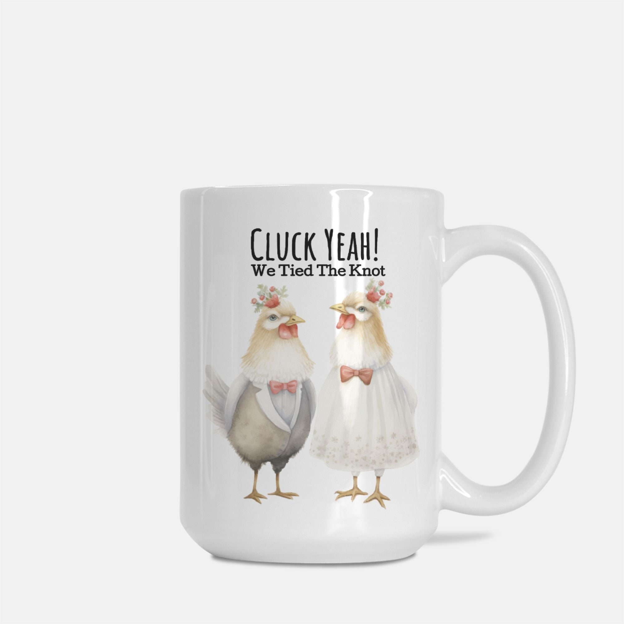 Mug with cartoon chickens in wedding attire and text 'Cluck Yeah! We Tied The Knot' on a white background