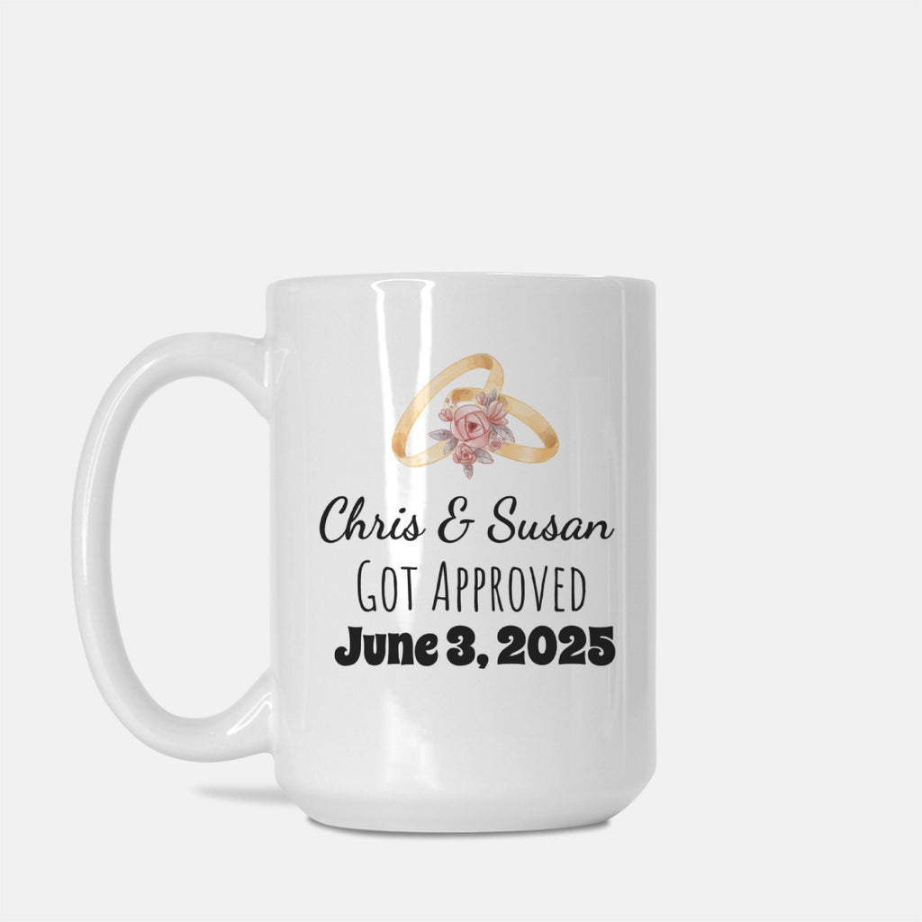 White mug with wedding rings and text on a white background