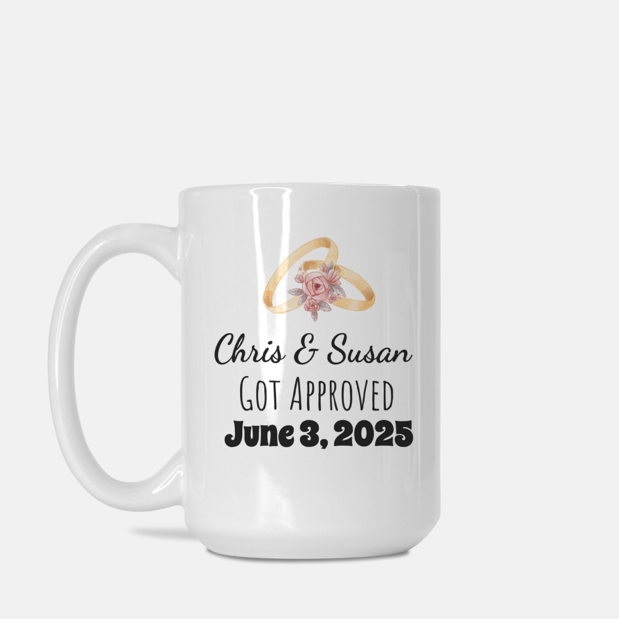 White mug with wedding rings and text on a white background