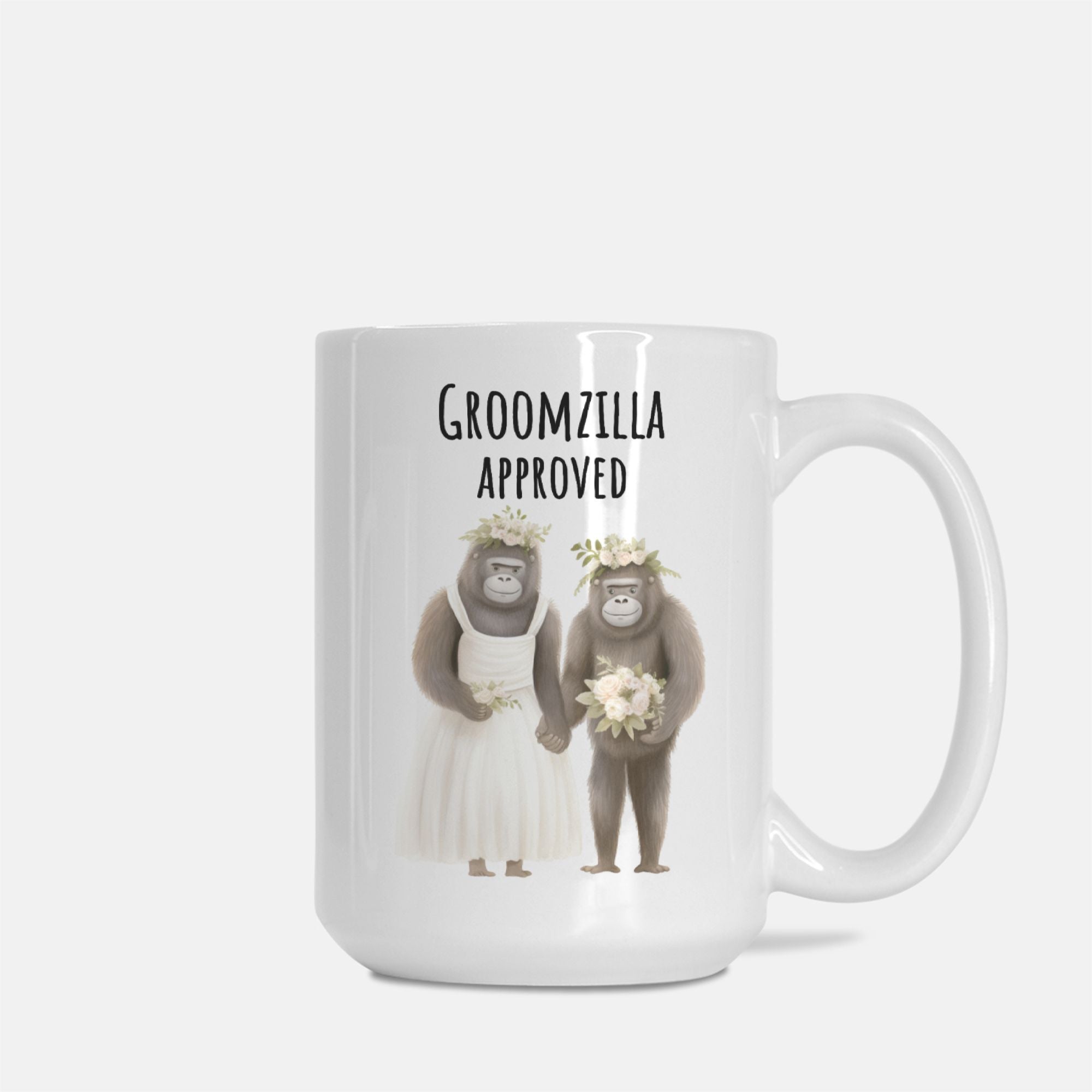 Mug with cartoon gorillas in wedding attire and 'Groomzilla Approved' text on a white background
