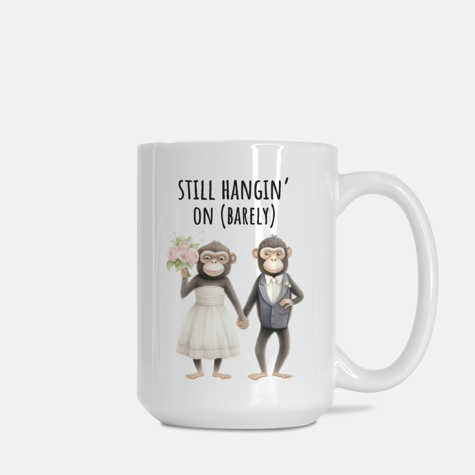 Mug with cartoon monkeys in wedding attire and humorous text on a white background